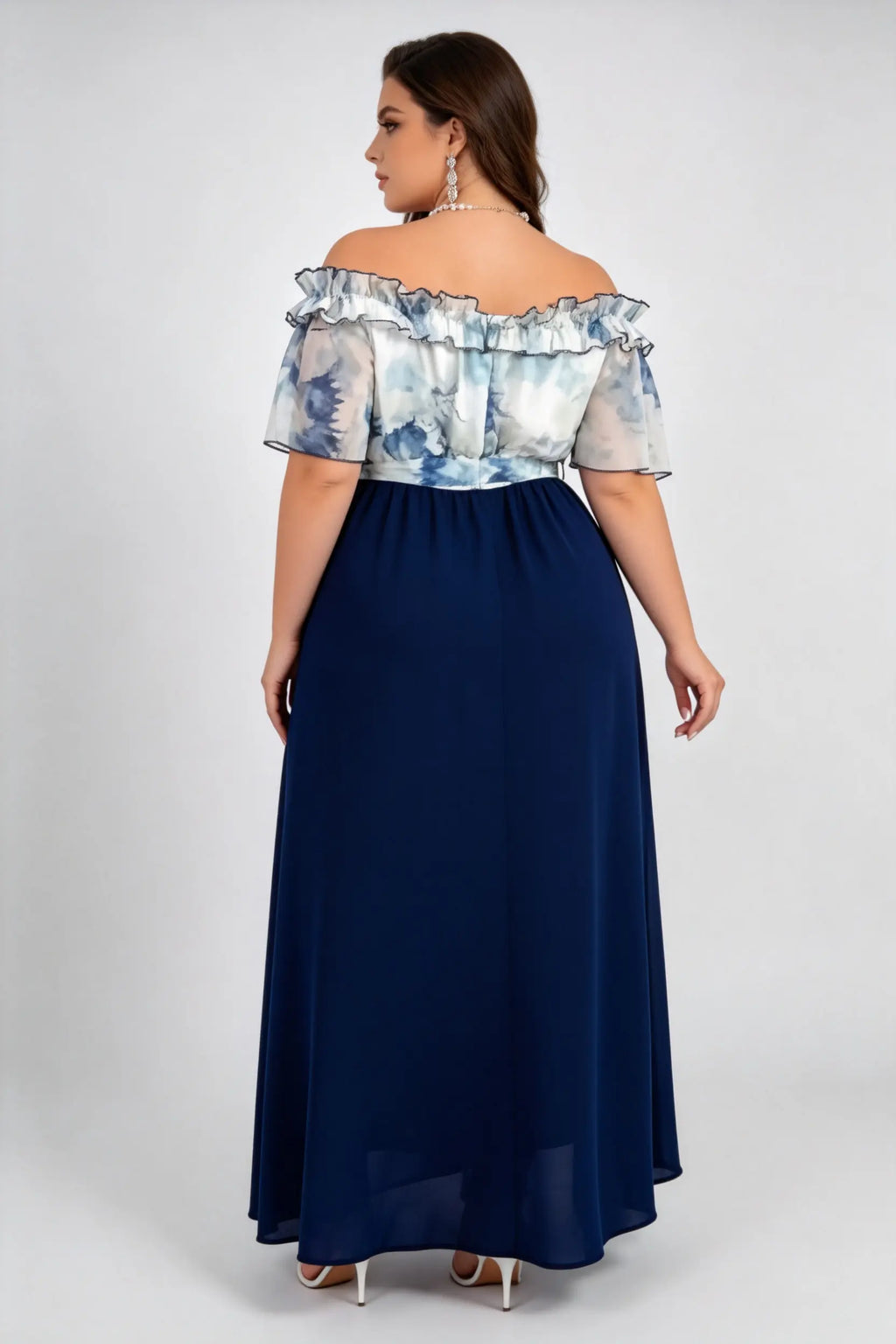 Curvy model wearing plus size navy off-the-shoulder ink wash mock two-piece maxi dress