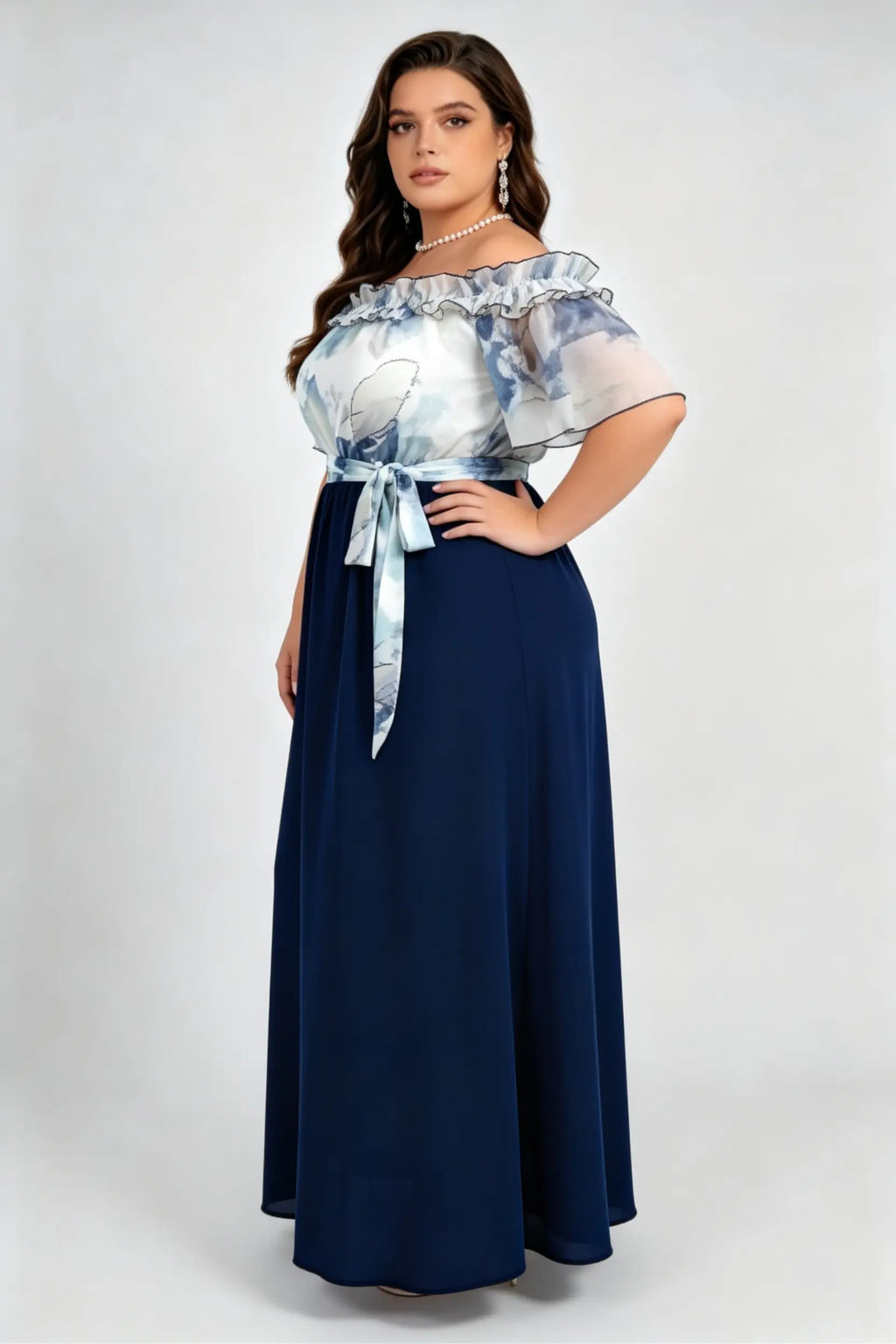 Curvy model wearing plus size navy off-the-shoulder ink wash mock two-piece maxi dress