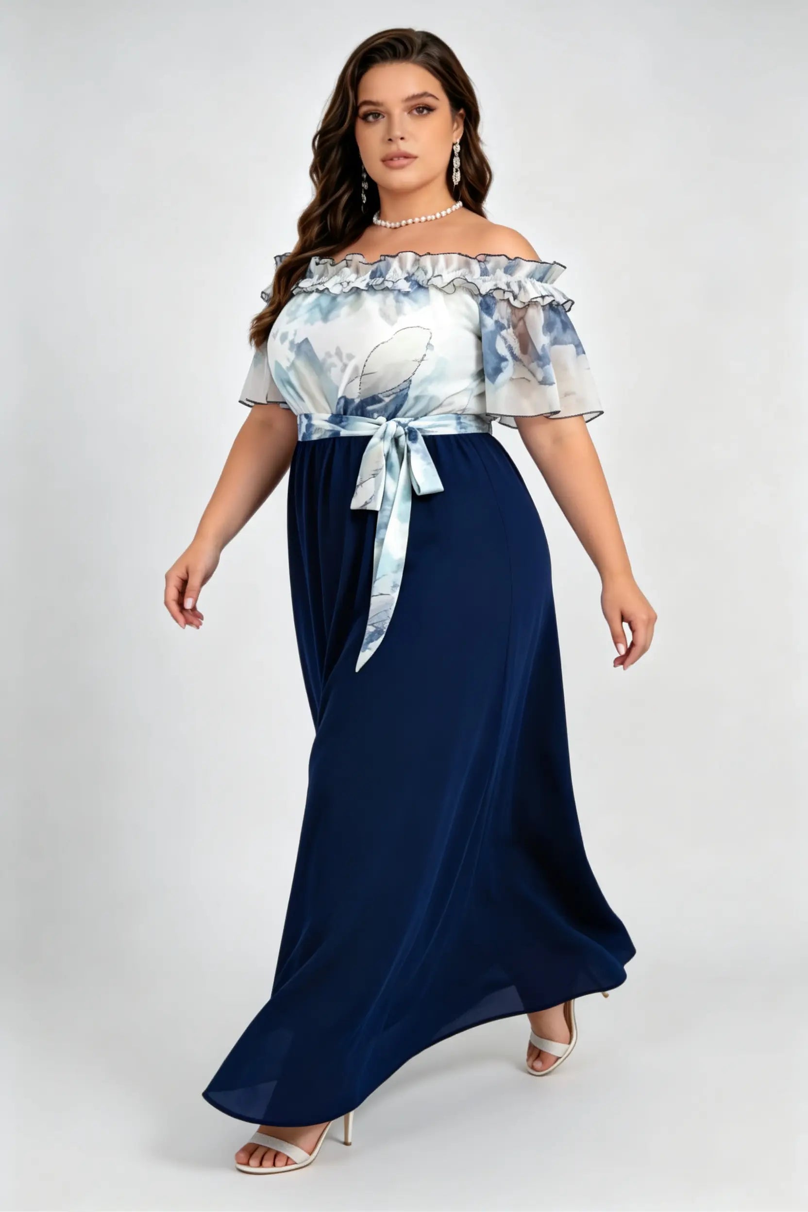Curvy model wearing plus size navy off-the-shoulder ink wash mock two-piece maxi dress