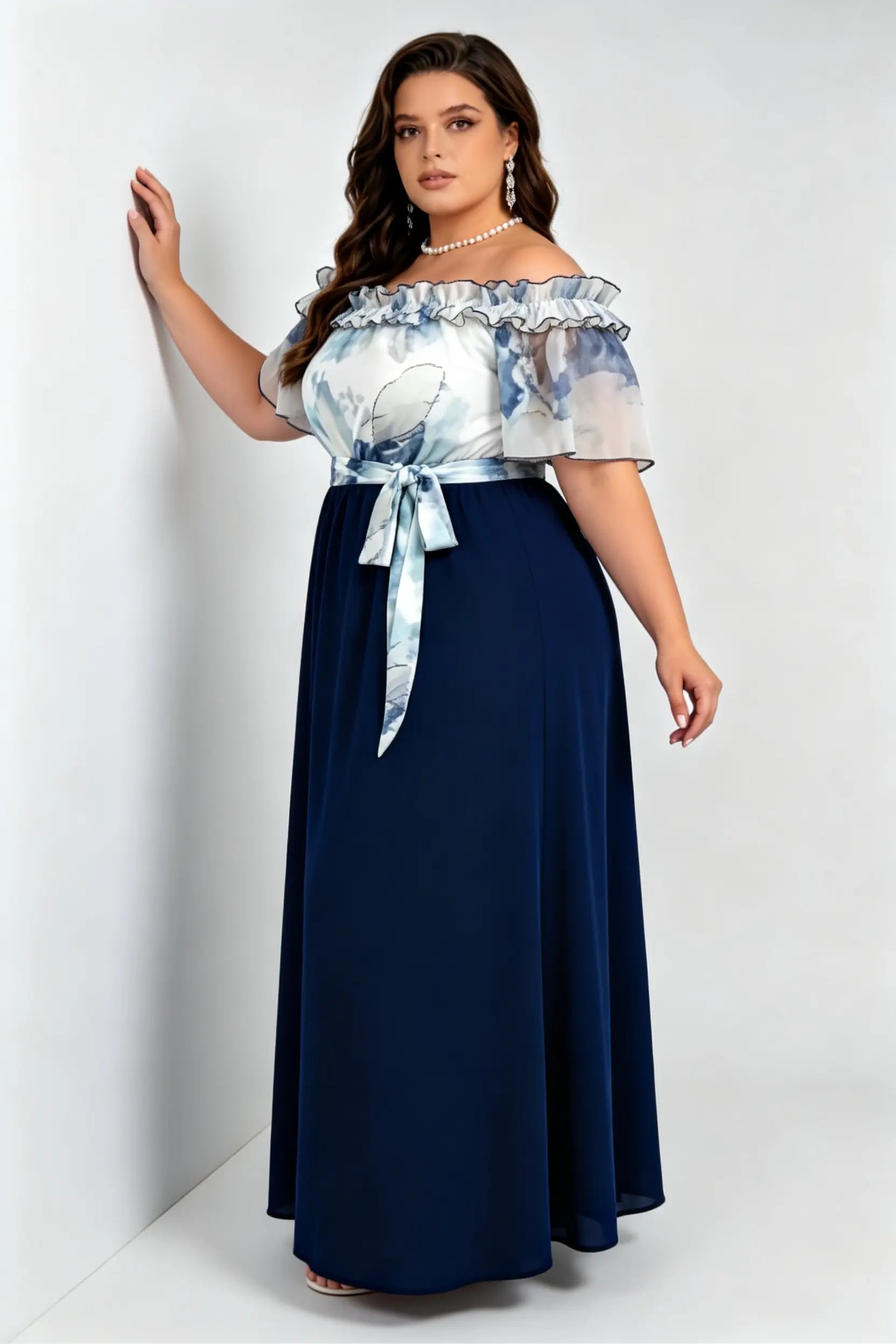 Curvy model wearing plus size navy off-the-shoulder ink wash mock two-piece maxi dress