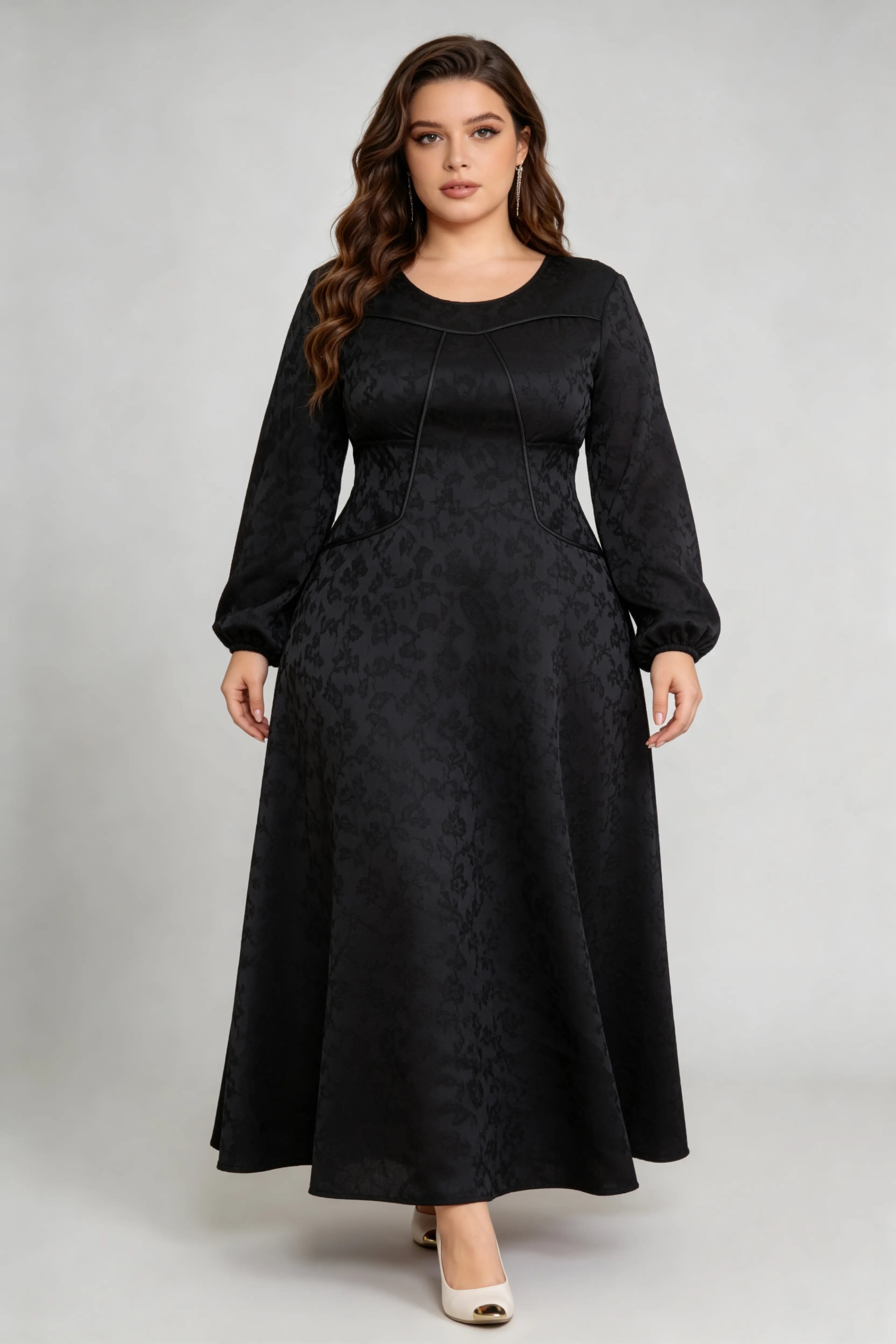 Curvy model wearing plus size luxury black jacquard structured a-line maxi dress
