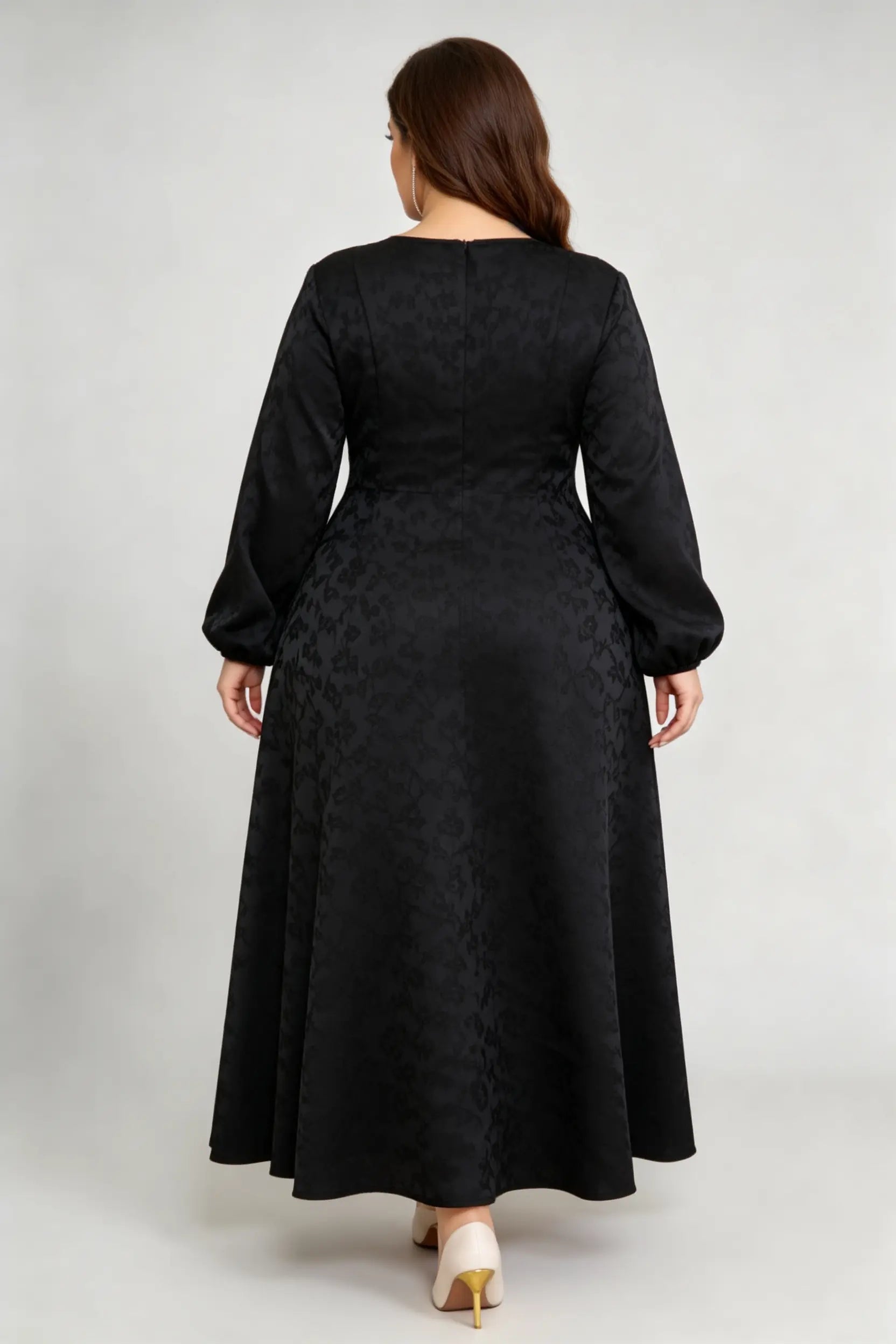 Curvy model wearing plus size luxury black jacquard structured a-line maxi dress