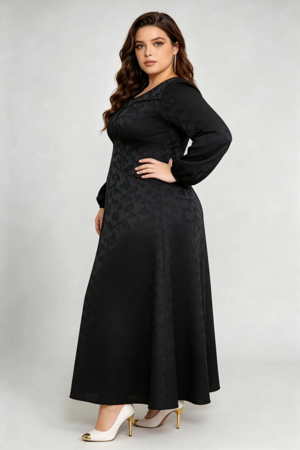 Curvy model wearing plus size luxury black jacquard structured a-line maxi dress