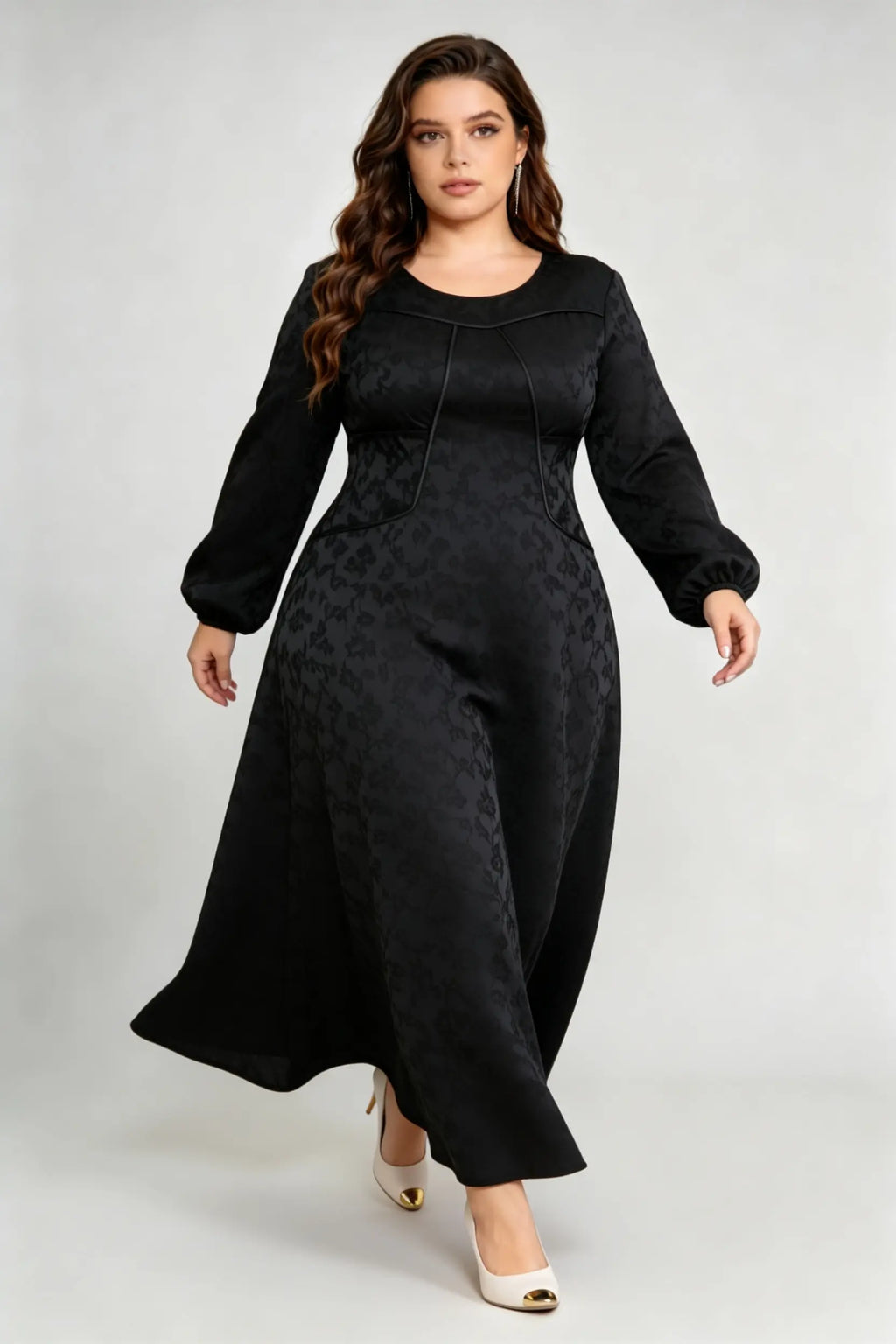 Curvy model wearing plus size luxury black jacquard structured a-line maxi dress