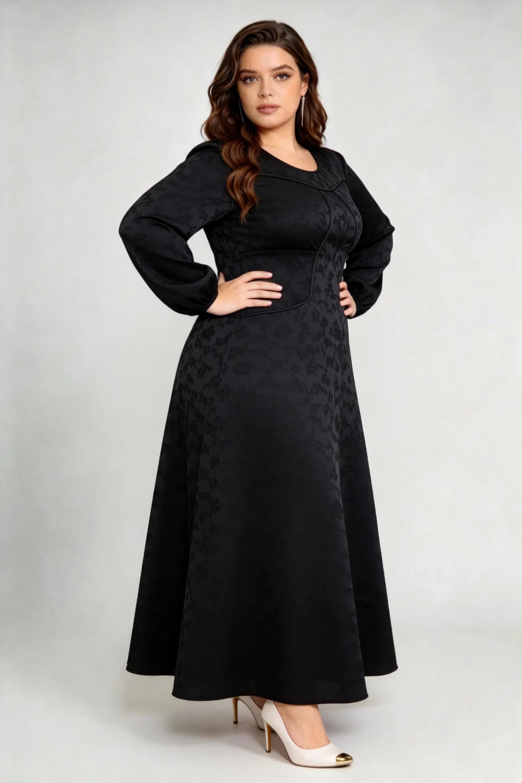 Curvy model wearing plus size luxury black jacquard structured a-line maxi dress