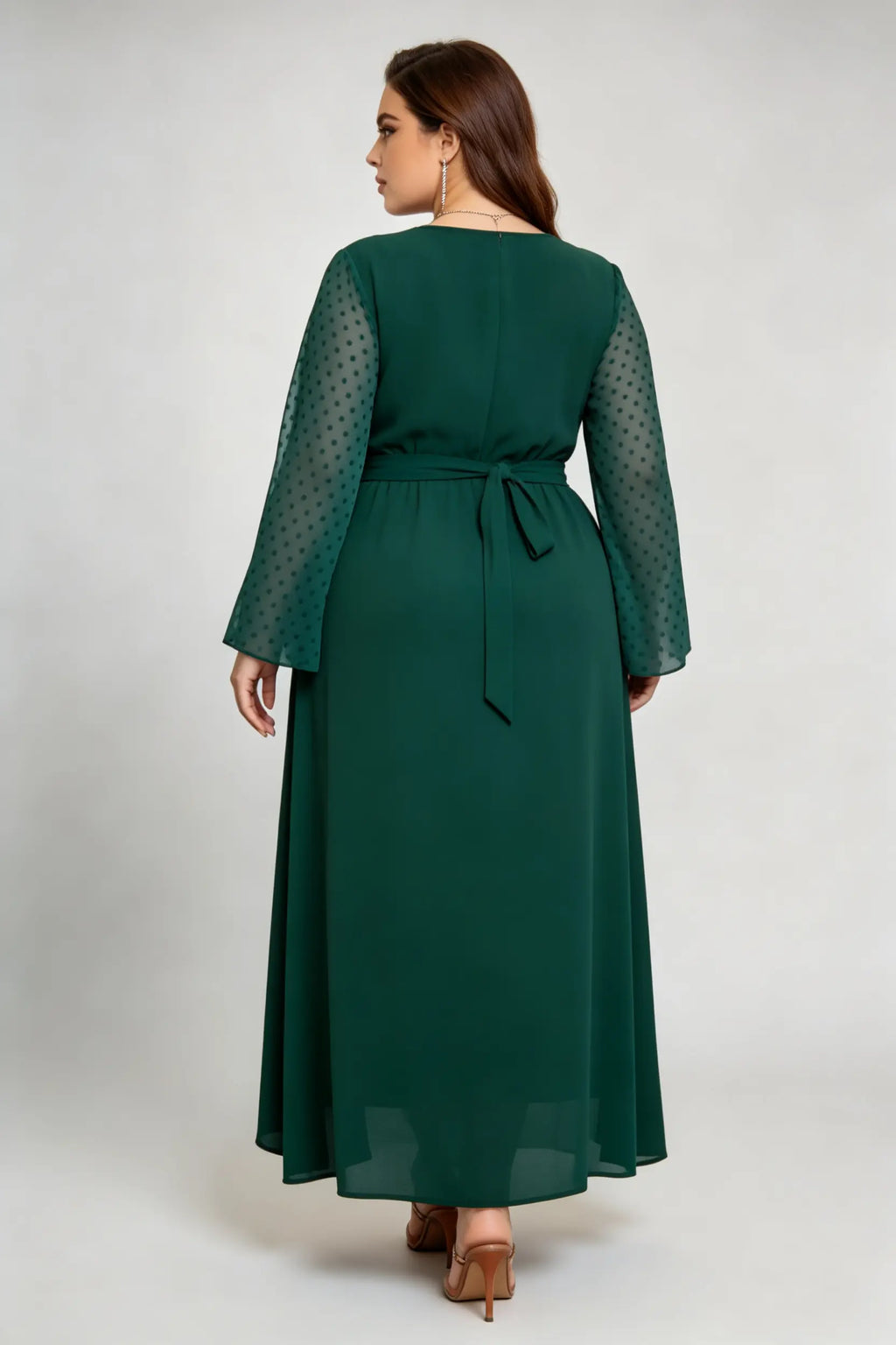 Curvy model wearing phoehua plus size olive-green emerald green faux-wrap sheer dot sleeve maxi dress
