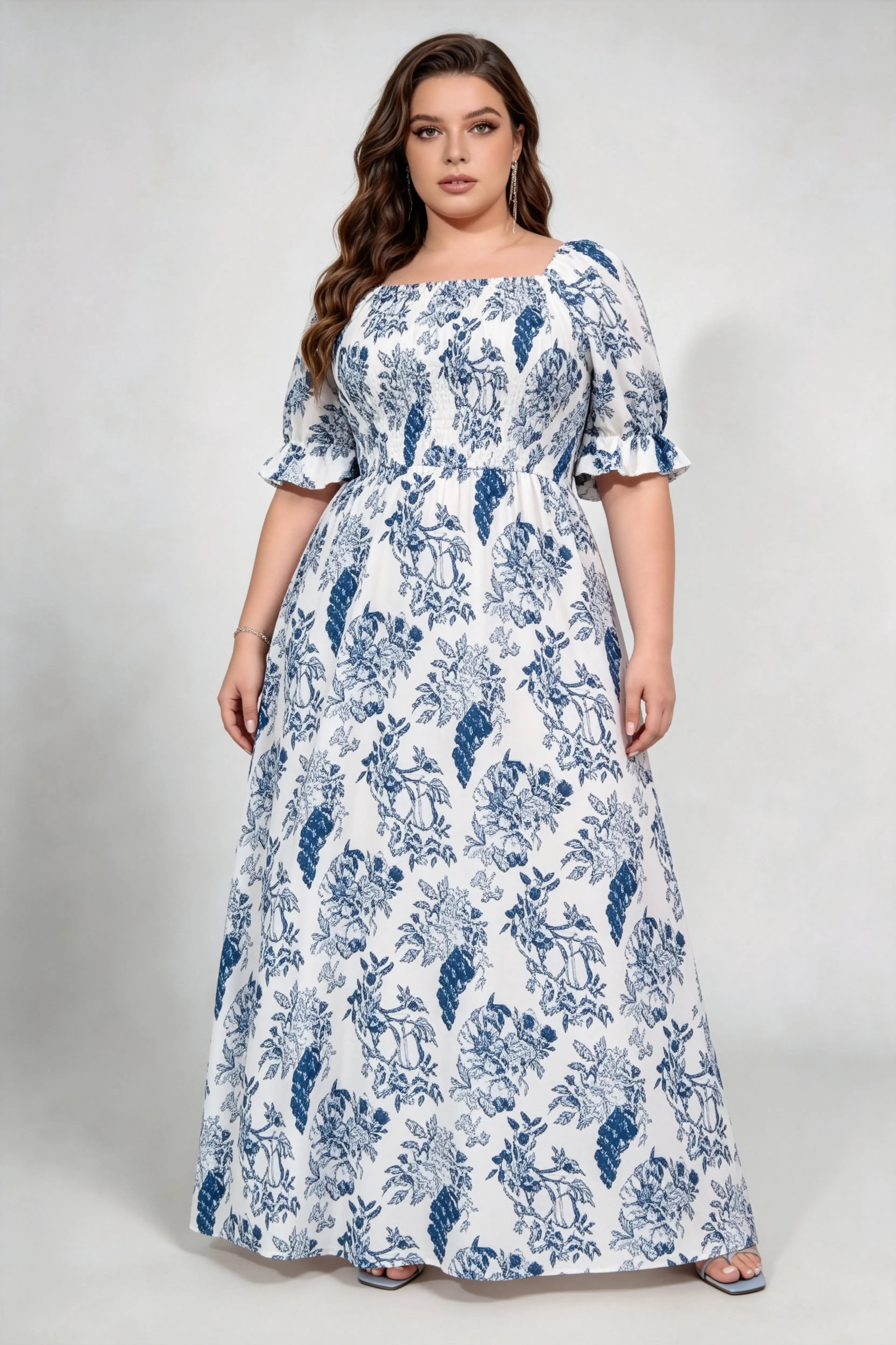Curvy model wearing plus size blue white floral square neck maxi dress, smocked bodice puff sleeve a‑line flowy elegant casual summer dress