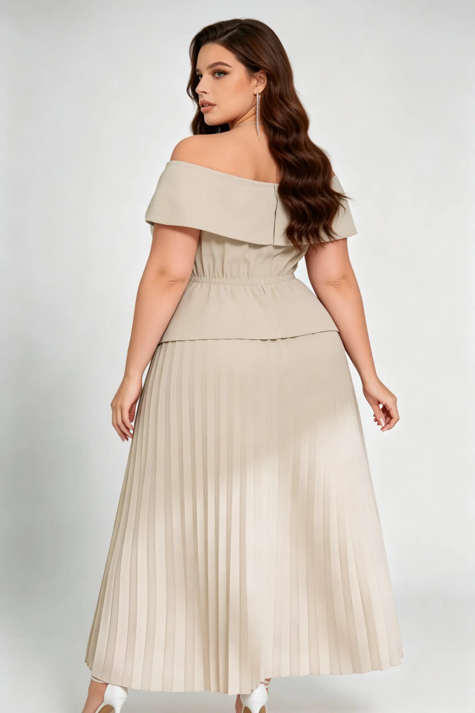 Curvy model wearing plus size apricot off-shoulder peplum pleated midi dress, double-breasted button front a-line elegant workwear summer dress