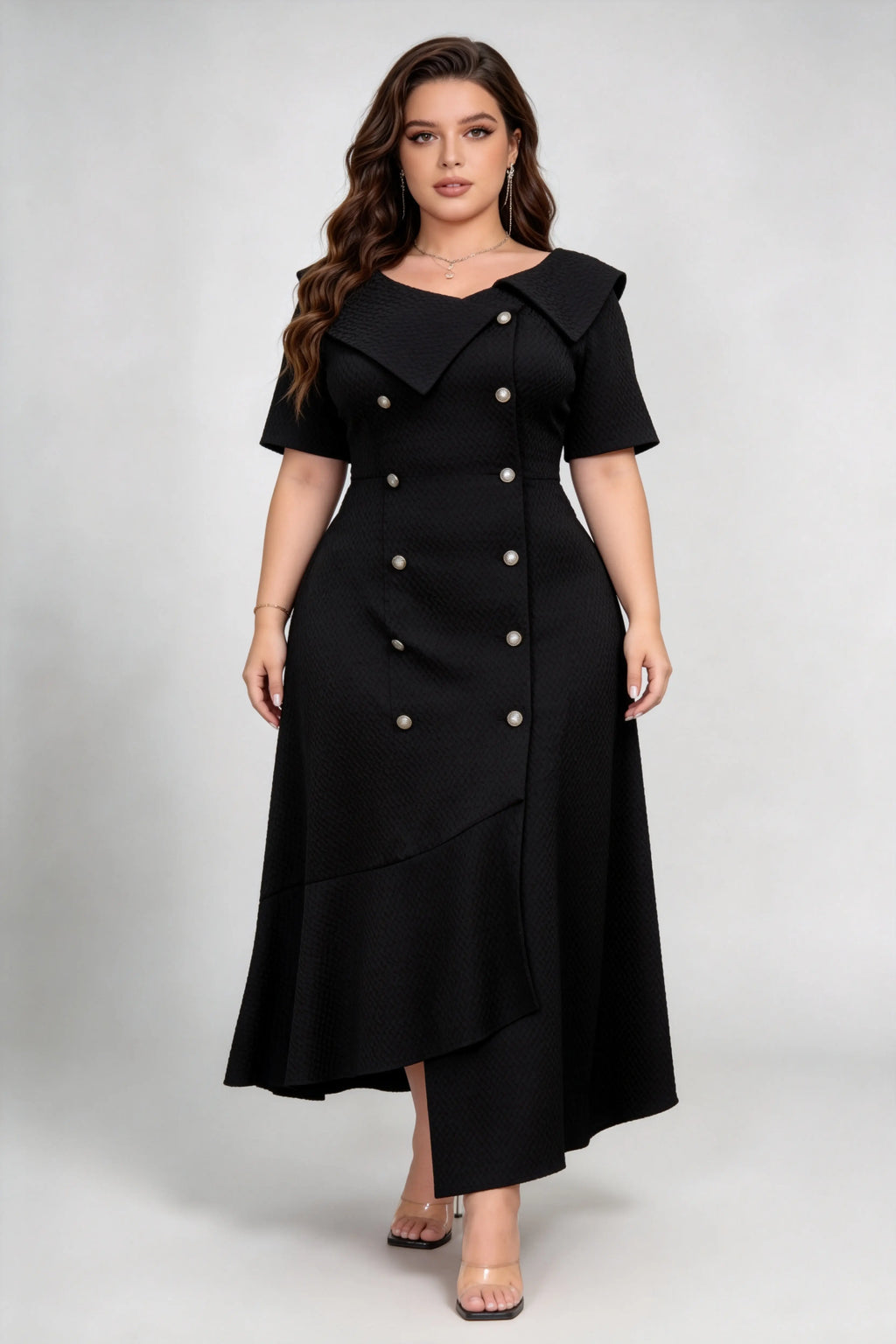 Curvy model wearing plus size black double-breasted asymmetric hem maxi dress, notched lapel short sleeve textured elegant workwear spring dress