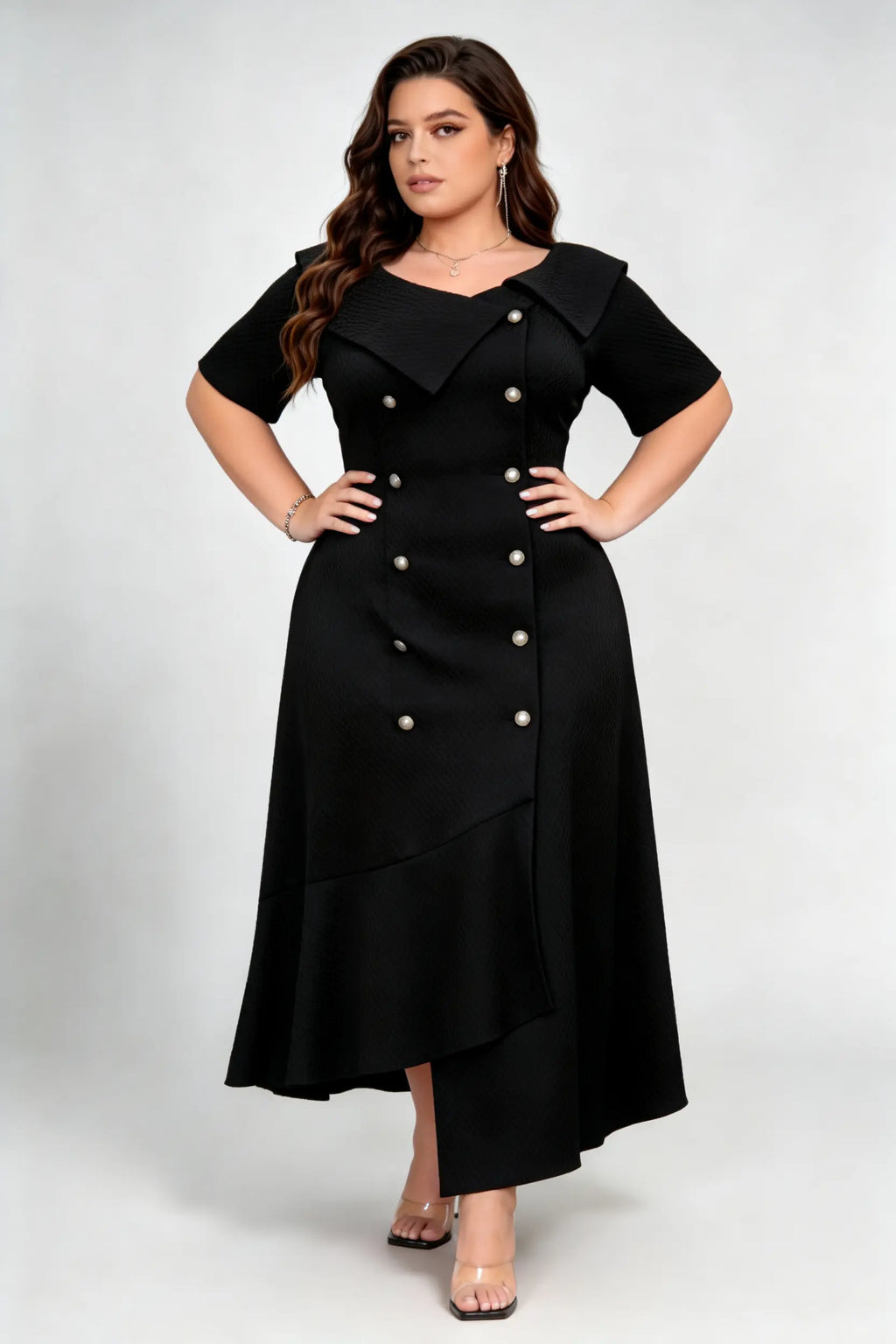 Curvy model wearing plus size black double-breasted asymmetric hem maxi dress, notched lapel short sleeve textured elegant workwear spring dress
