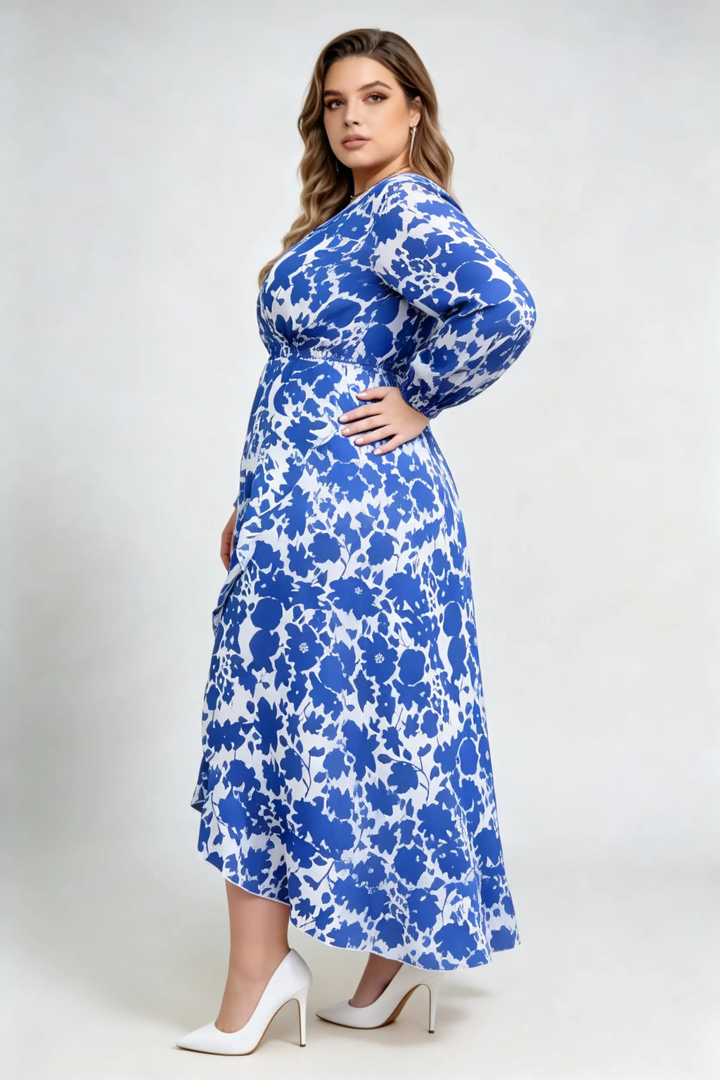 Curvy model wearing plus size blue floral print wrap maxi dress, v-neck long sleeve high-low ruffle hem a-line elegant casual dress
