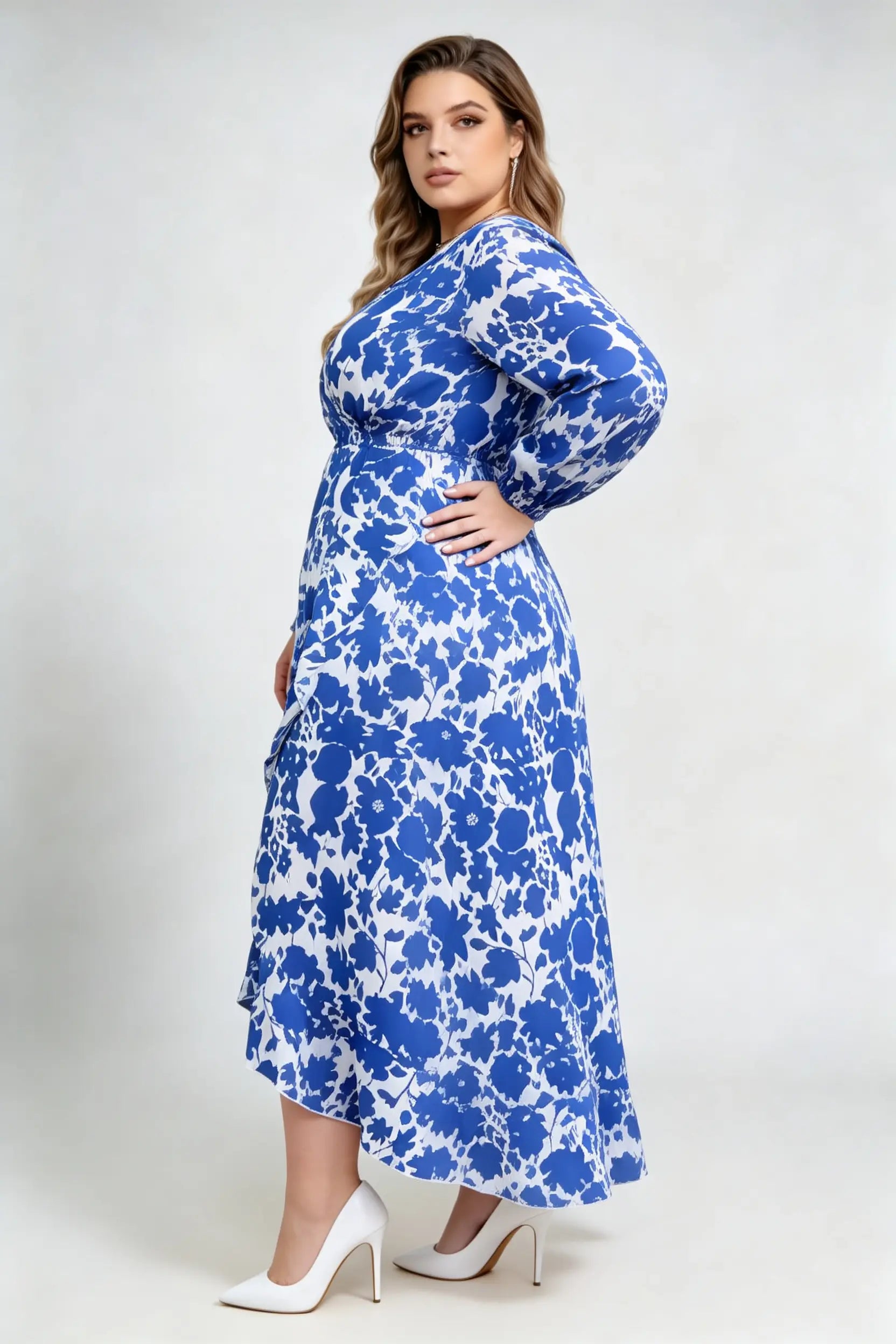 Curvy model wearing plus size blue floral print wrap maxi dress, v-neck long sleeve high-low ruffle hem a-line elegant casual dress