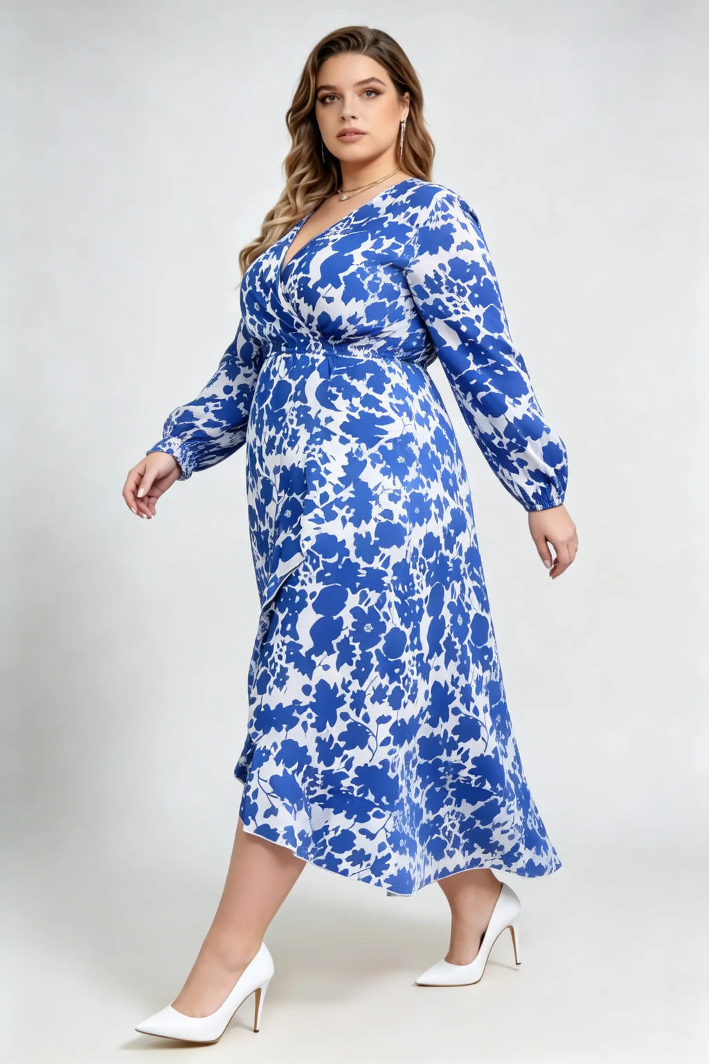 Curvy model wearing plus size blue floral print wrap maxi dress, v-neck long sleeve high-low ruffle hem a-line elegant casual dress