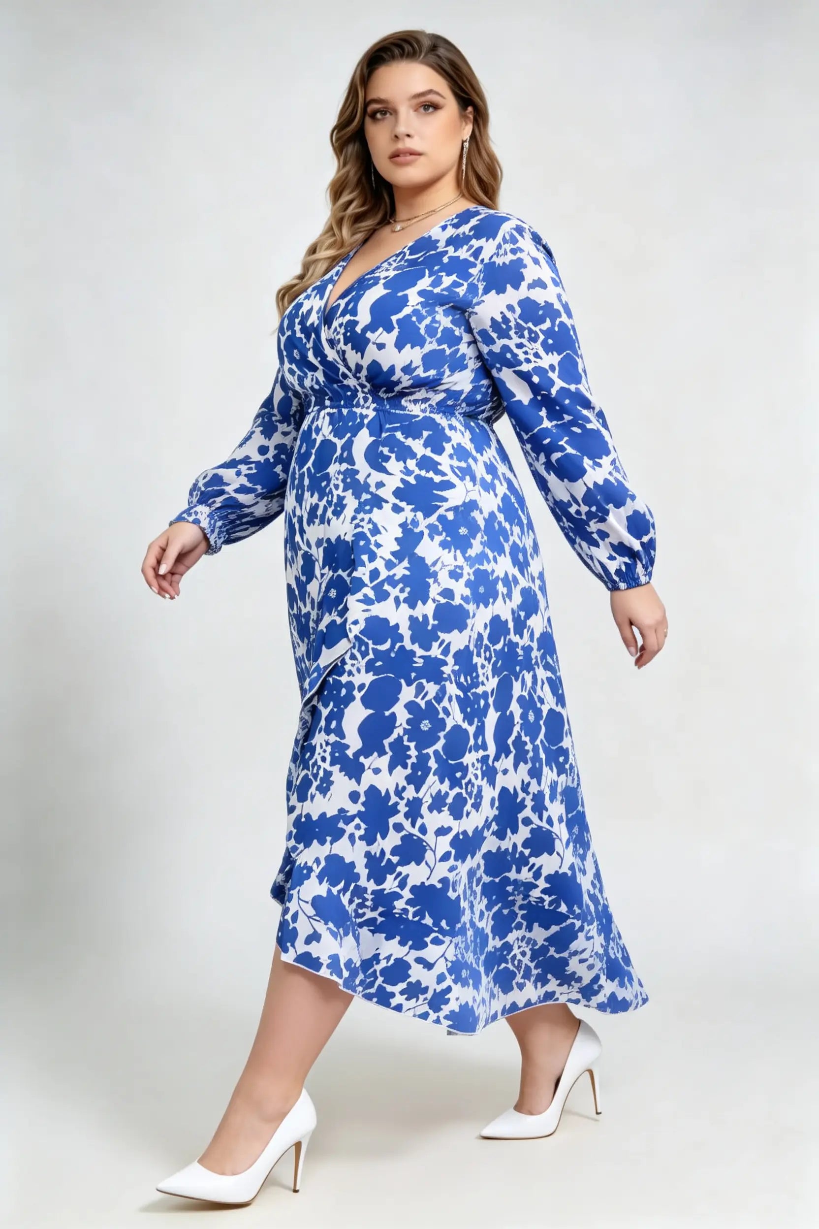 Curvy model wearing plus size blue floral print wrap maxi dress, v-neck long sleeve high-low ruffle hem a-line elegant casual dress