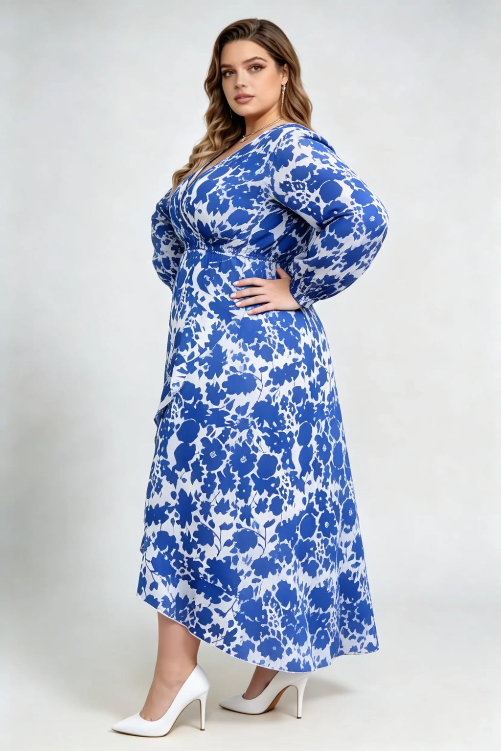 Curvy model wearing plus size blue floral print wrap maxi dress, v-neck long sleeve high-low ruffle hem a-line elegant casual dress