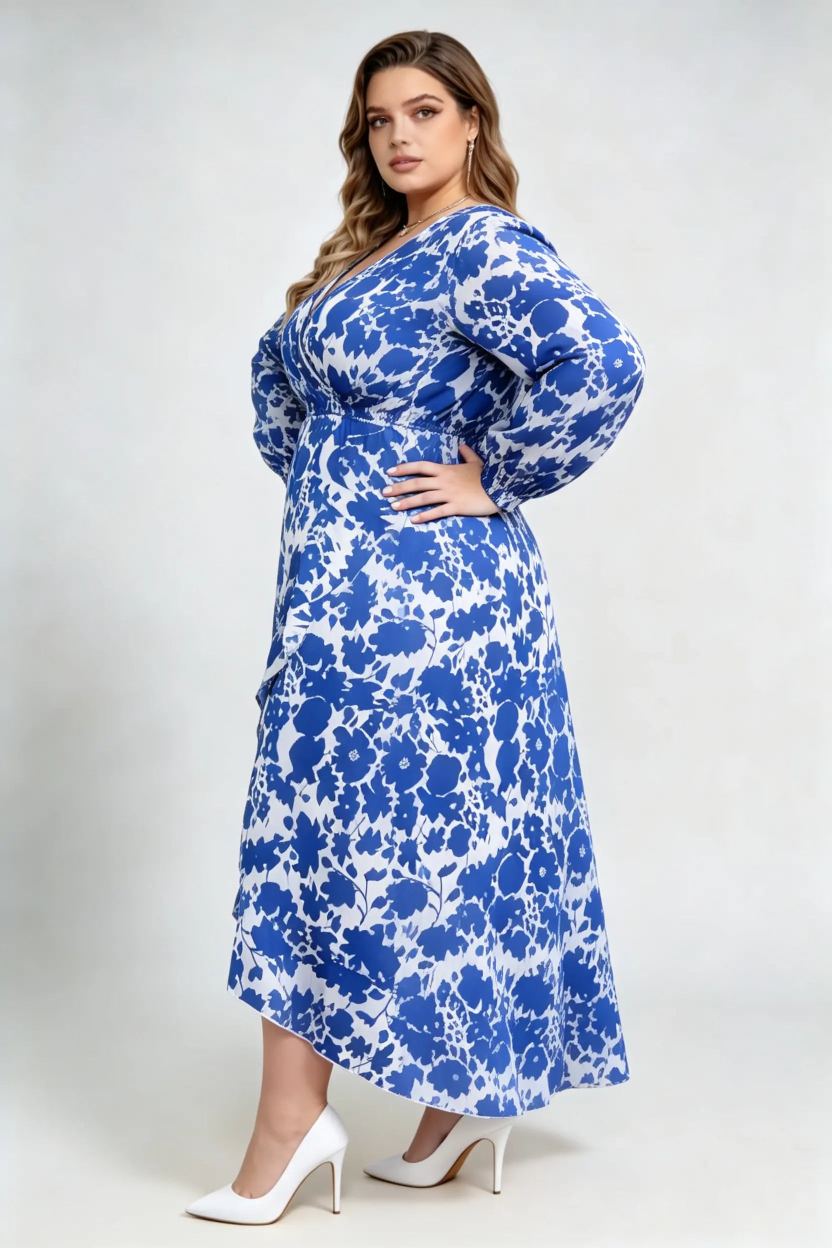 Curvy model wearing plus size blue floral print wrap maxi dress, v-neck long sleeve high-low ruffle hem a-line elegant casual dress