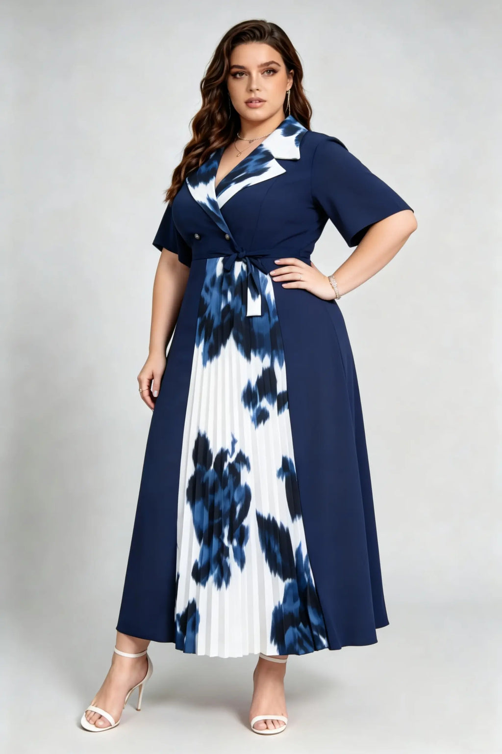 Curvy model wearing plus size navy blue tie-dye pleated midi dress, suit collar short sleeve belted a-line work dress