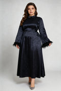 Curvy model wearing plus size black jacquard feather cuff maxi dress, stand collar long sleeve back tie a-line formal dress