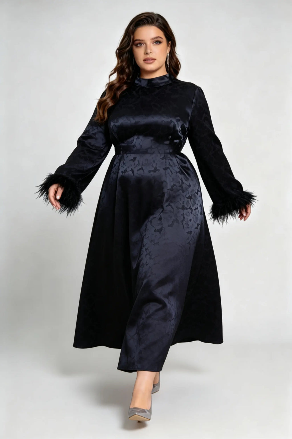 Curvy model wearing plus size black jacquard feather cuff maxi dress, stand collar long sleeve back tie a-line formal dress