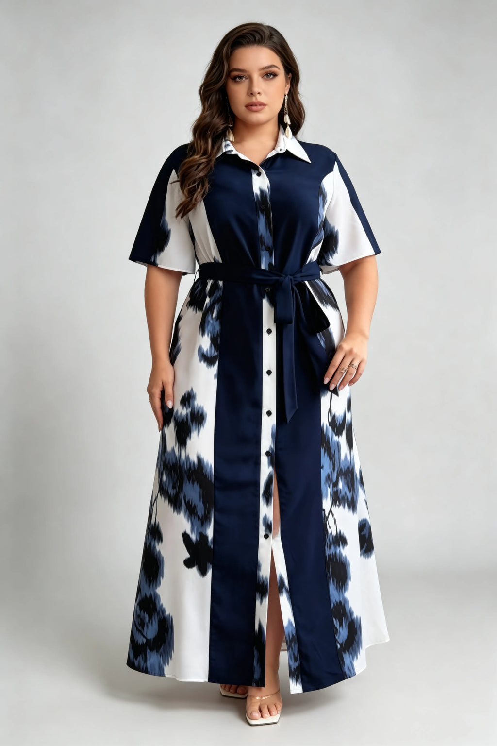 Curvy model wearing plus size blue navy & white floral shirt maxi dress, collared short sleeve self-tie belted a-line dress