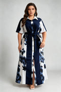 Curvy model wearing plus size blue navy & white floral shirt maxi dress, collared short sleeve self-tie belted a-line dress