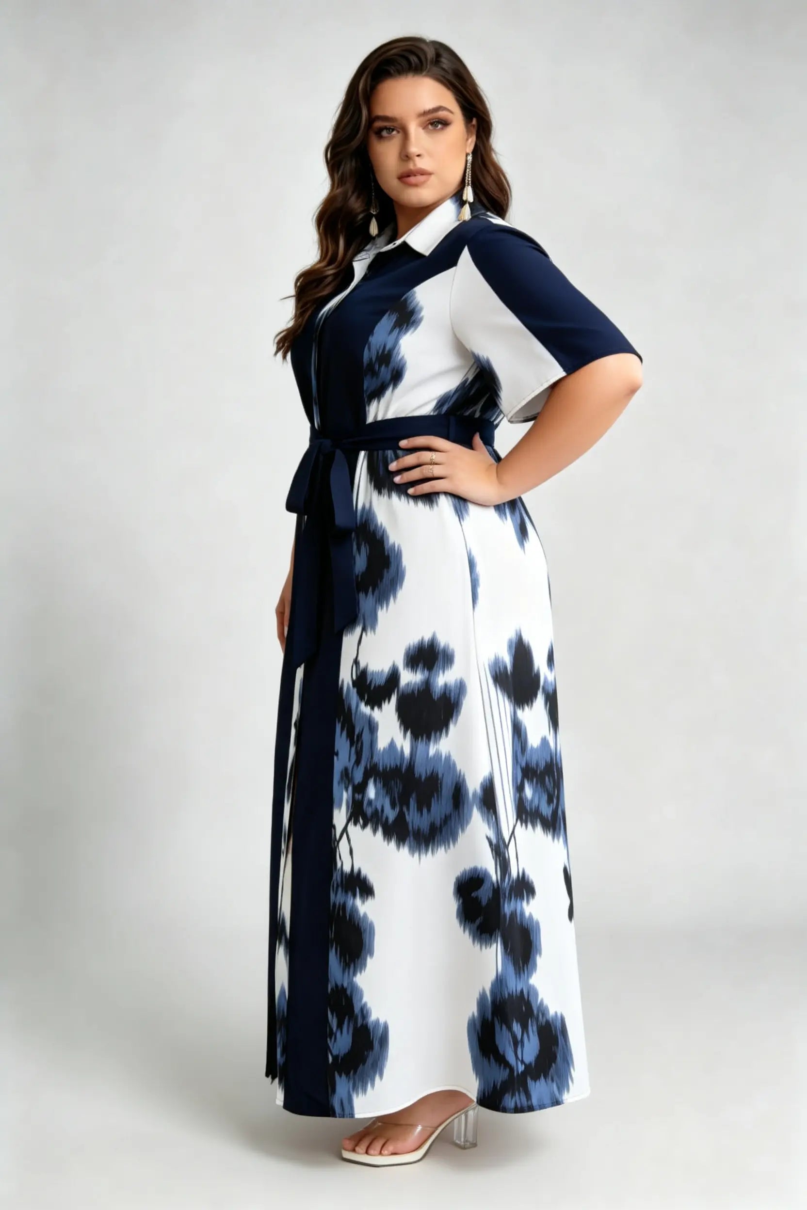 Curvy model wearing plus size blue navy & white floral shirt maxi dress, collared short sleeve self-tie belted a-line dress
