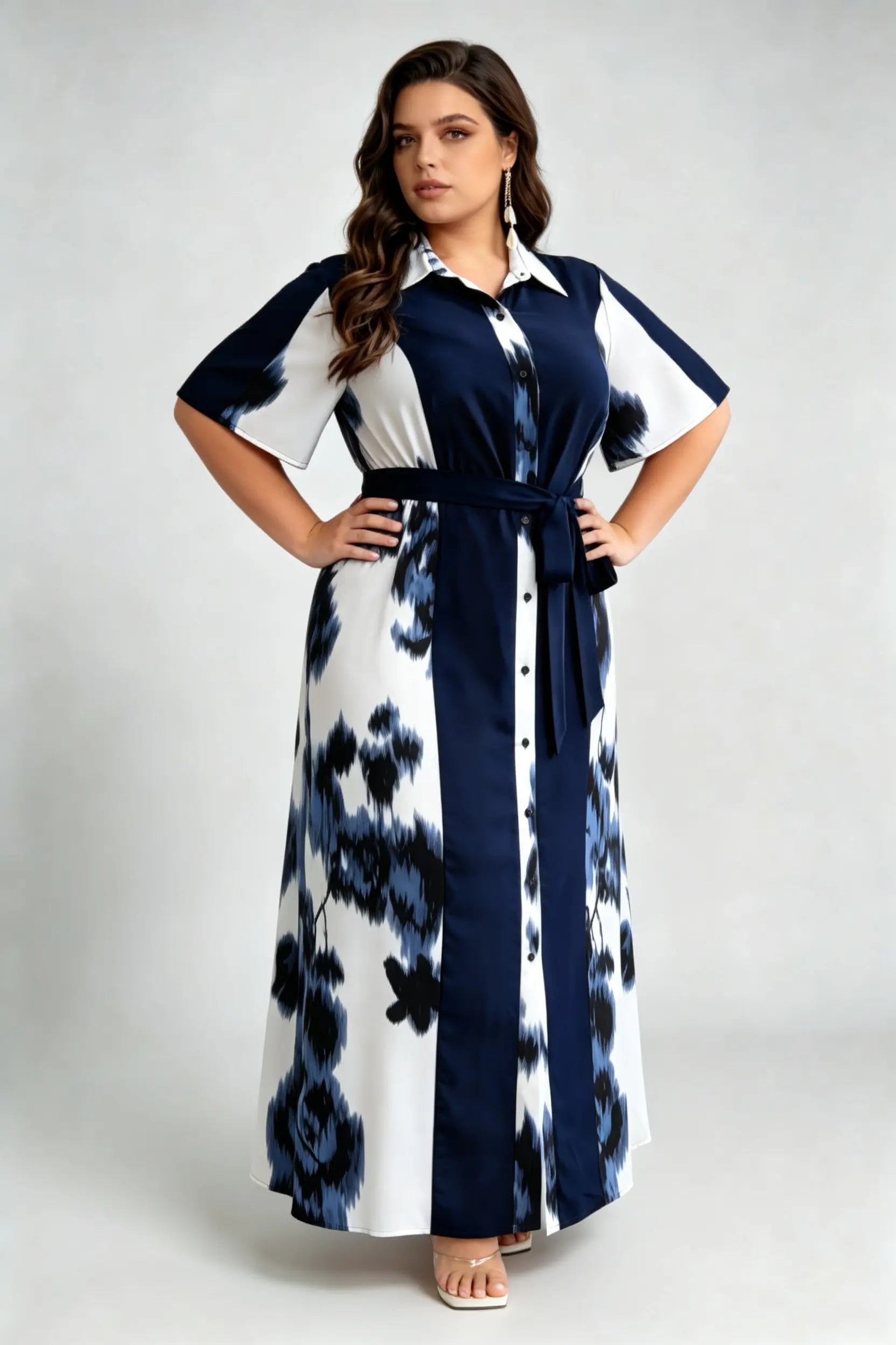 Curvy model wearing plus size blue navy & white floral shirt maxi dress, collared short sleeve self-tie belted a-line dress