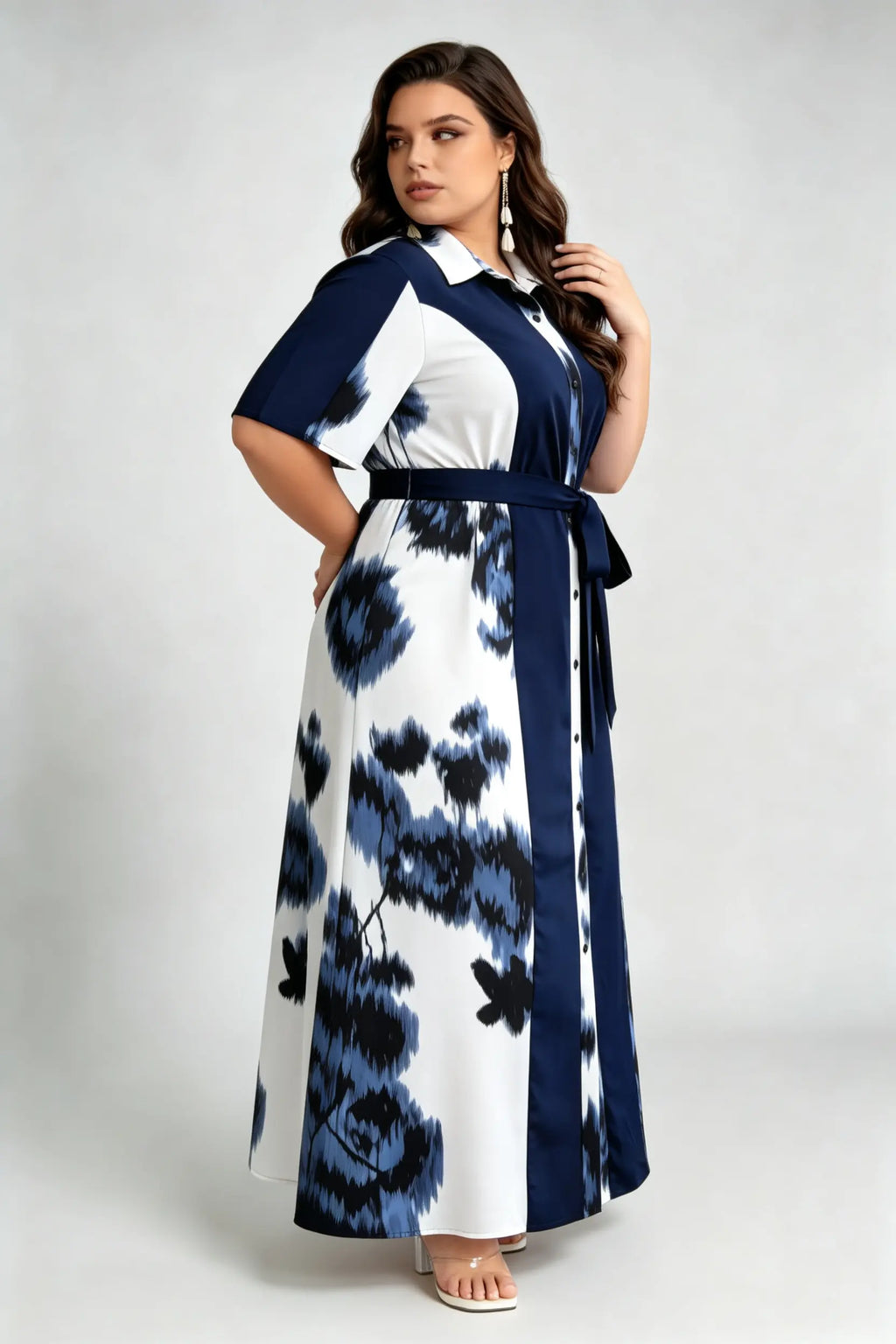 Curvy model wearing plus size blue navy & white floral shirt maxi dress, collared short sleeve self-tie belted a-line dress