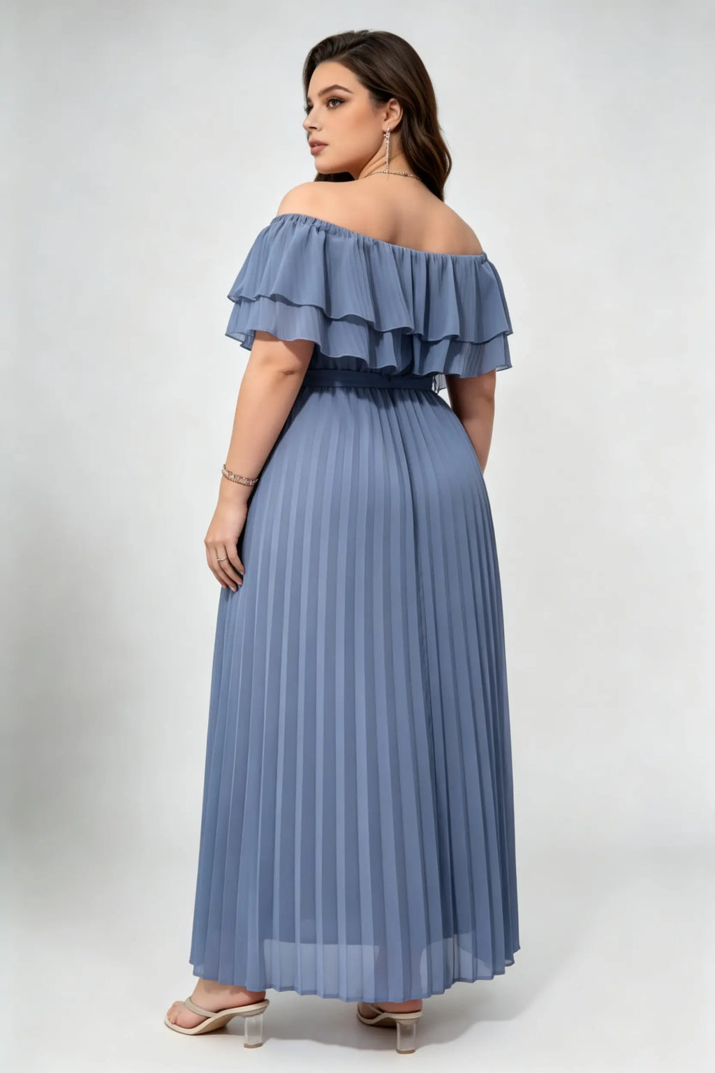 Curvy model wearing plus size dusty blue off-shoulder pleated maxi dress, layered ruffle self-tie belted a-line formal dress