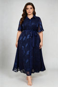 Curvy model wearing plus size blue navy leaf jacquard shirt maxi dress, collared short sleeve self-tie belted a-line dress