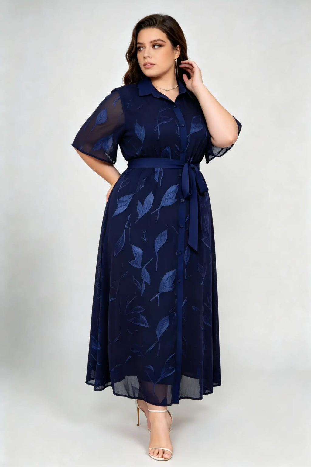 Curvy model wearing plus size blue navy leaf jacquard shirt maxi dress, collared short sleeve self-tie belted a-line dress