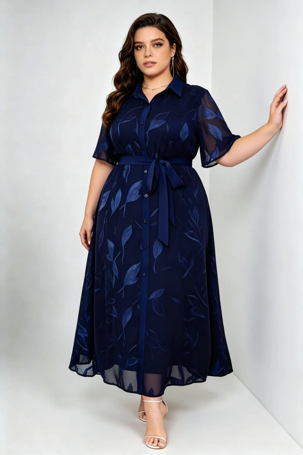 Curvy model wearing plus size blue navy leaf jacquard shirt maxi dress, collared short sleeve self-tie belted a-line dress