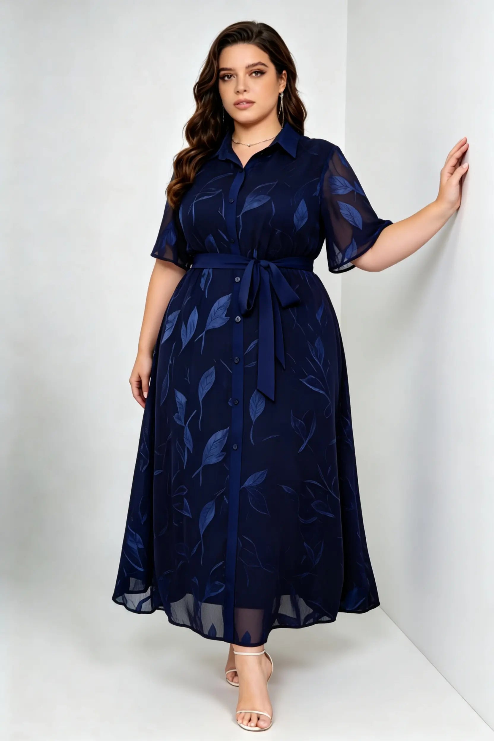 Curvy model wearing plus size blue navy leaf jacquard shirt maxi dress, collared short sleeve self-tie belted a-line dress