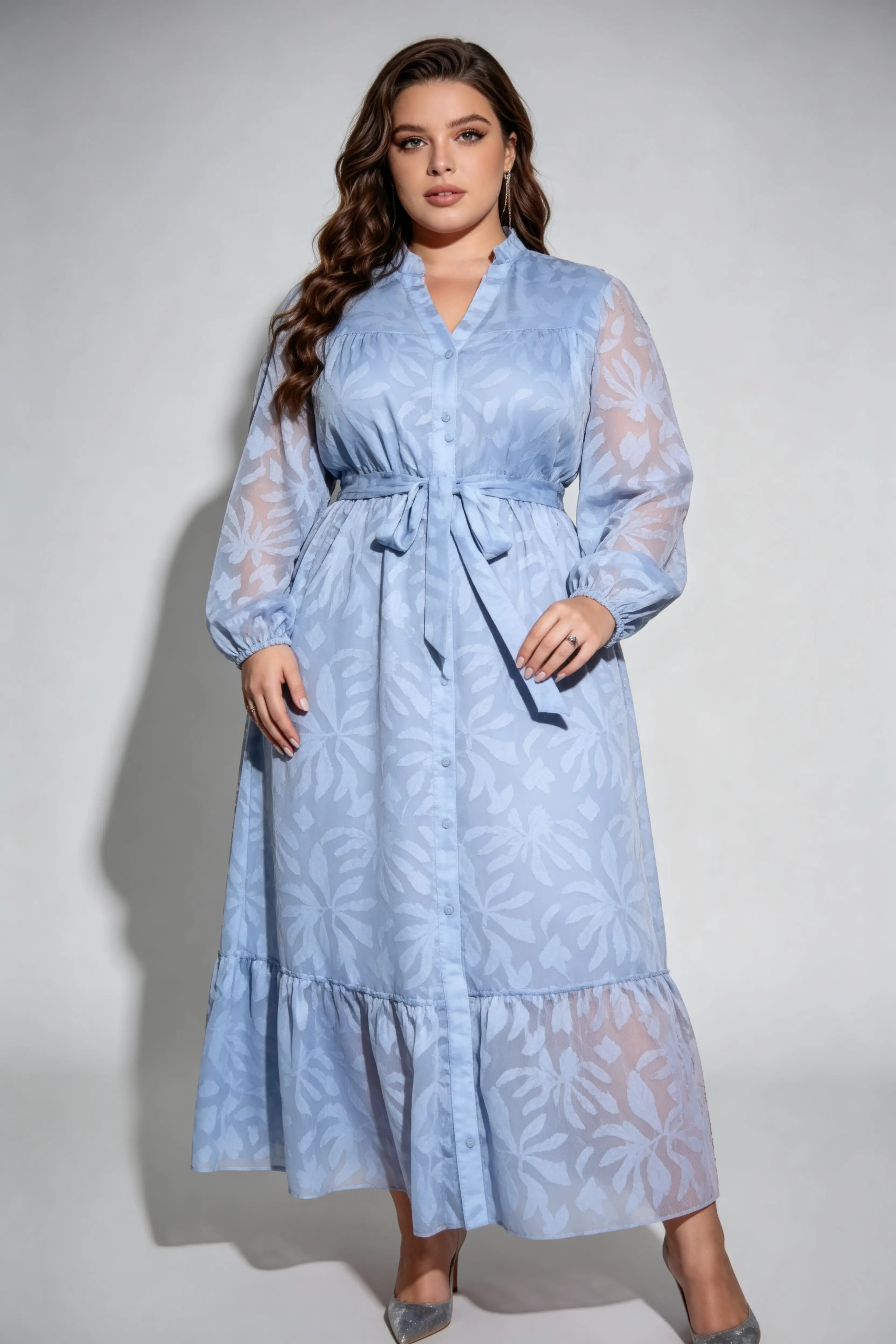 Curvy model wearing plus size light blue floral jacquard shirt maxi dress, long sleeve button-down with waist tie, elegant summer dress