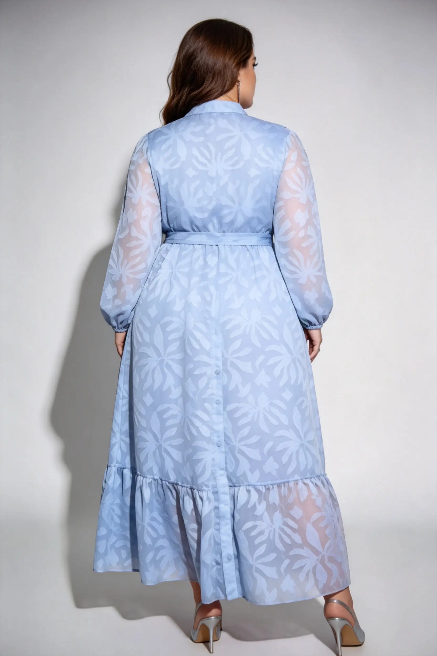 Curvy model wearing plus size light blue floral jacquard shirt maxi dress, long sleeve button-down with waist tie, elegant summer dress