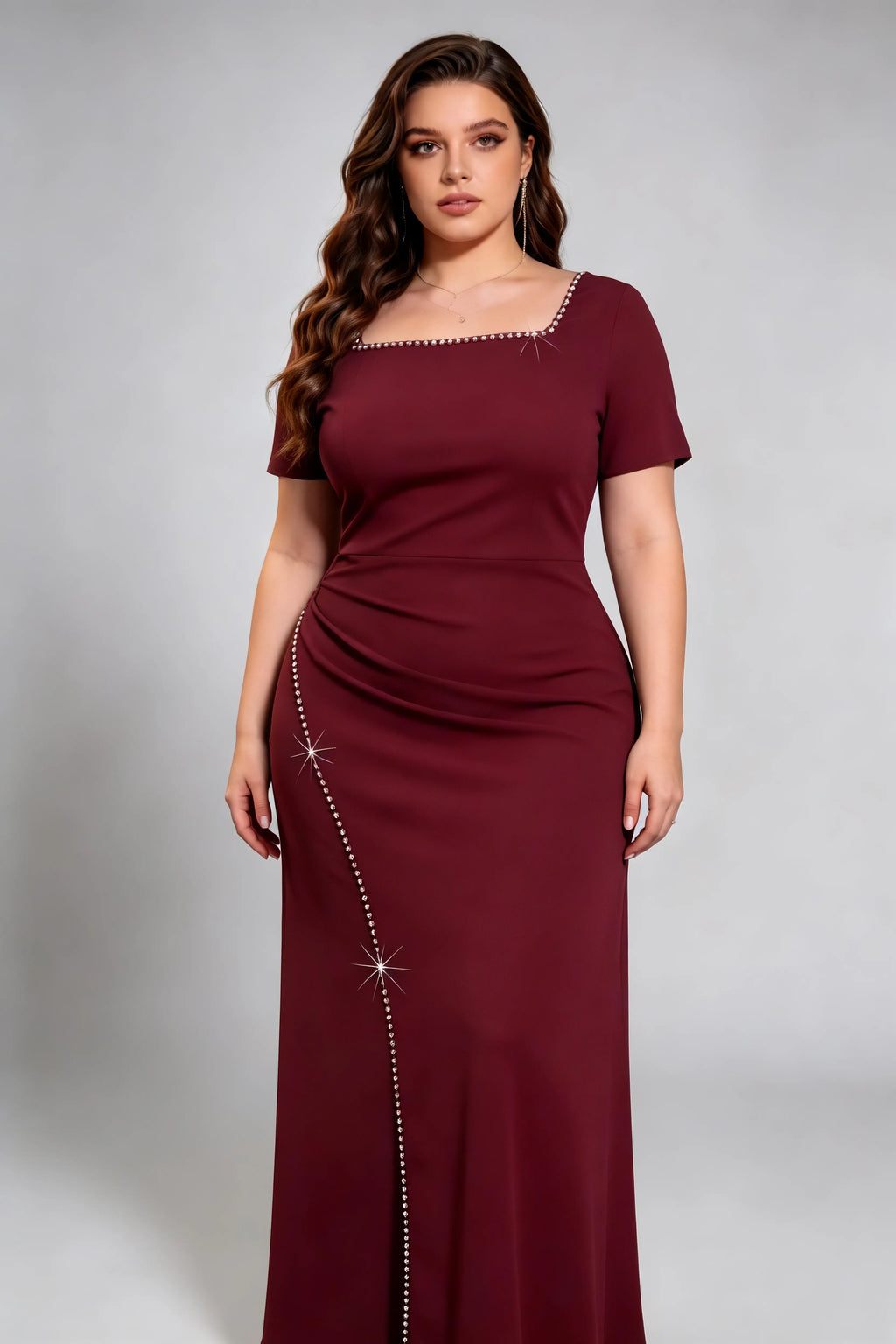 Curvy model wearing plus size rose-red burgundy rhinestone trim evening gown, square neck/off-shoulder mermaid maxi dress with slit