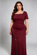 Curvy model wearing plus size rose-red burgundy rhinestone trim evening gown, square neck/off-shoulder mermaid maxi dress with slit