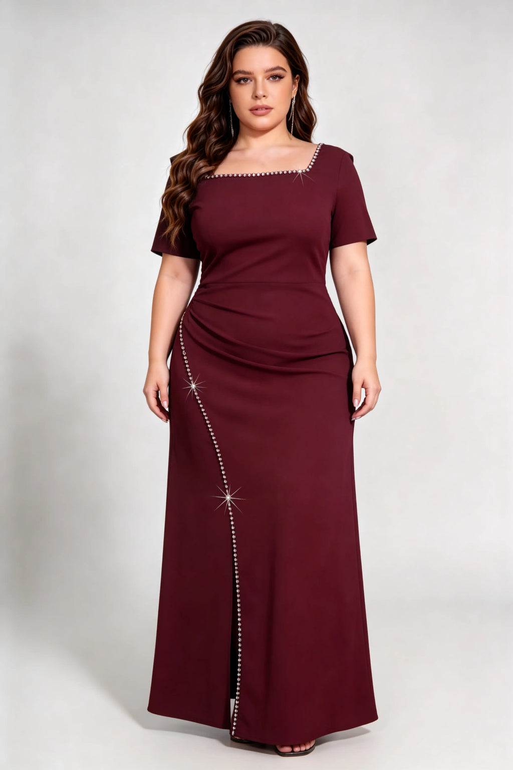 Curvy model wearing plus size rose-red burgundy rhinestone trim evening gown, square neck/off-shoulder mermaid maxi dress with slit