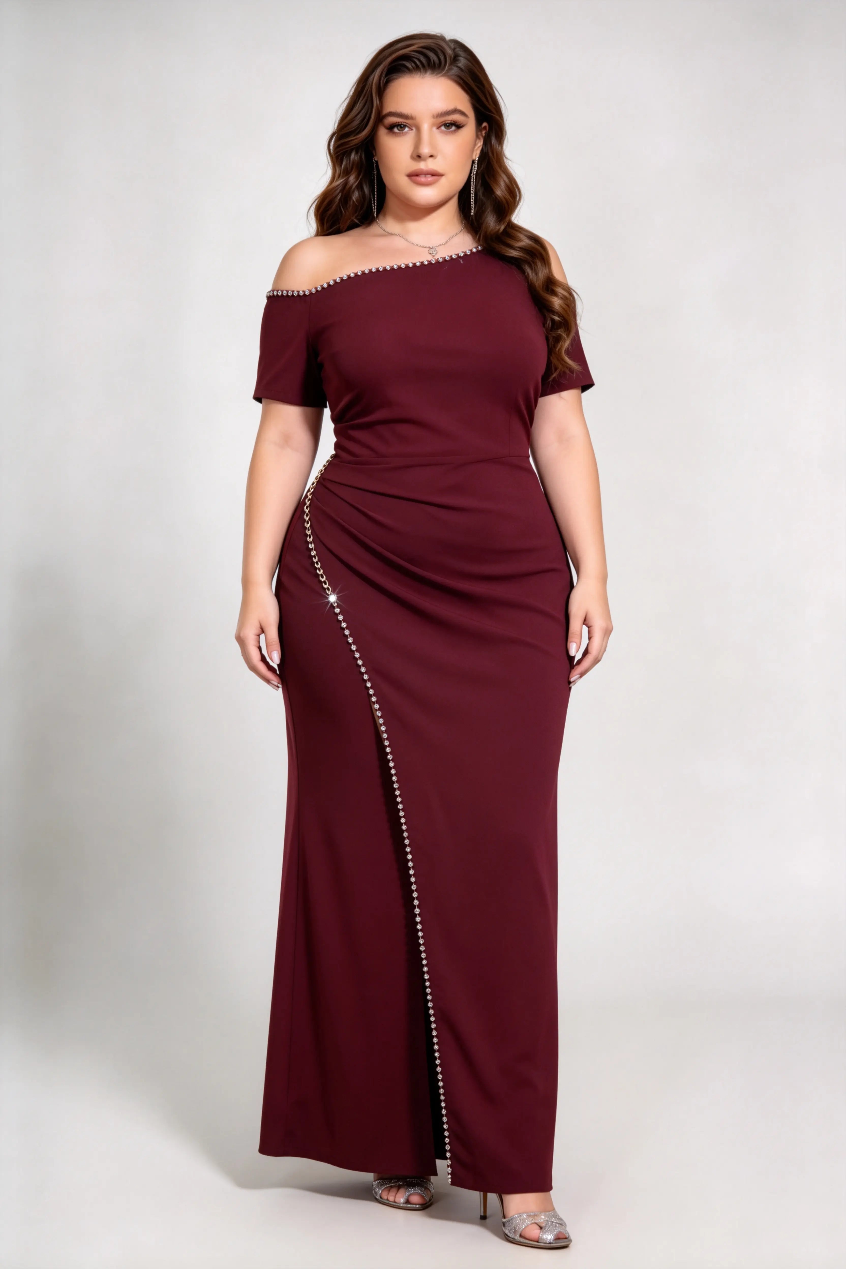 Curvy model wearing plus size rose-red burgundy rhinestone trim evening gown, square neck/off-shoulder mermaid maxi dress with slit