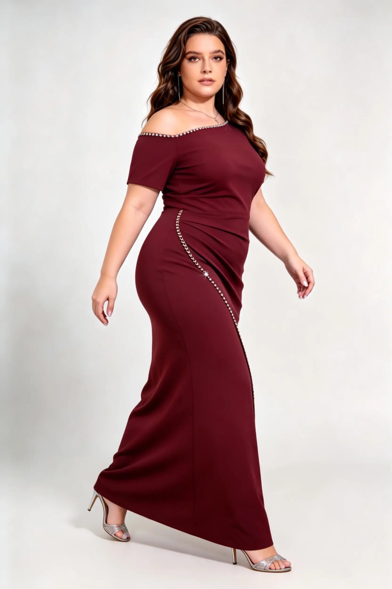 Curvy model wearing plus size rose-red burgundy rhinestone trim evening gown, square neck/off-shoulder mermaid maxi dress with slit