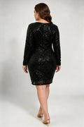 Curvy model wearing plus size black sequin v-neck long sleeve bodycon midi cocktail dress