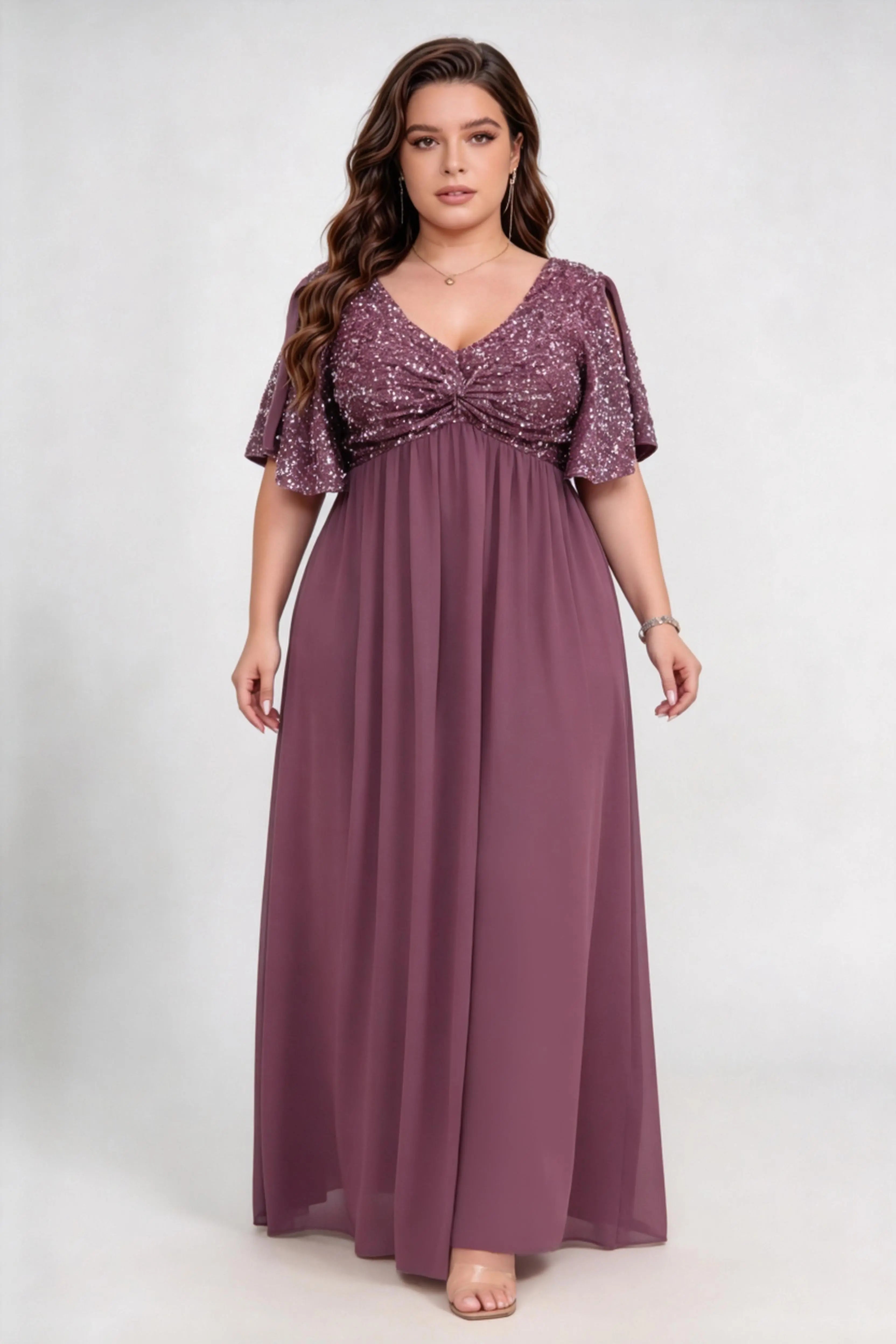 Curvy model wearing plus size purple sequin bodice flutter short sleeve chiffon maxi bridesmaid formal evening dress