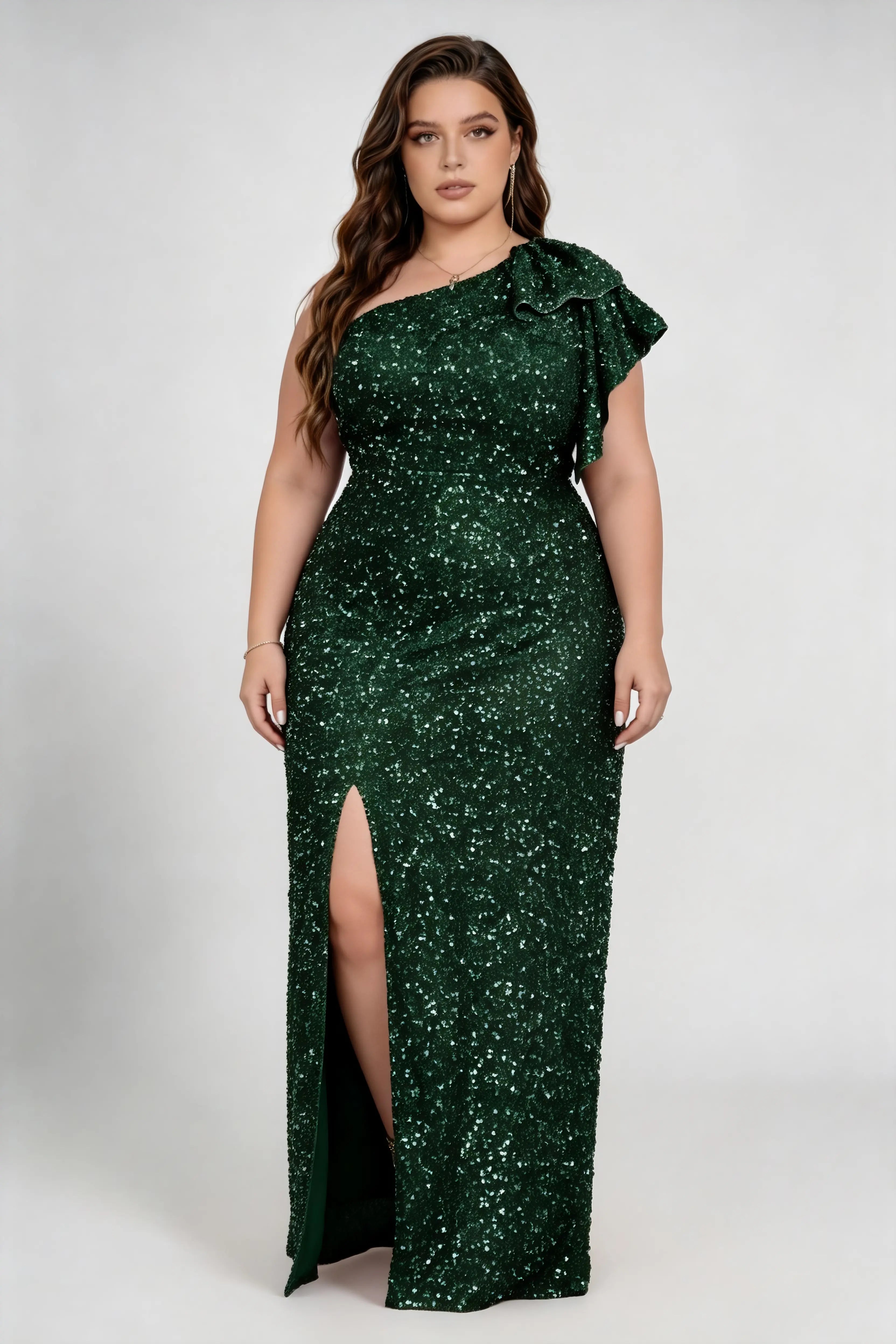 Curvy model wearing plus size green one shoulder ruffle all over sequin high split mermaid maxi formal evening gown