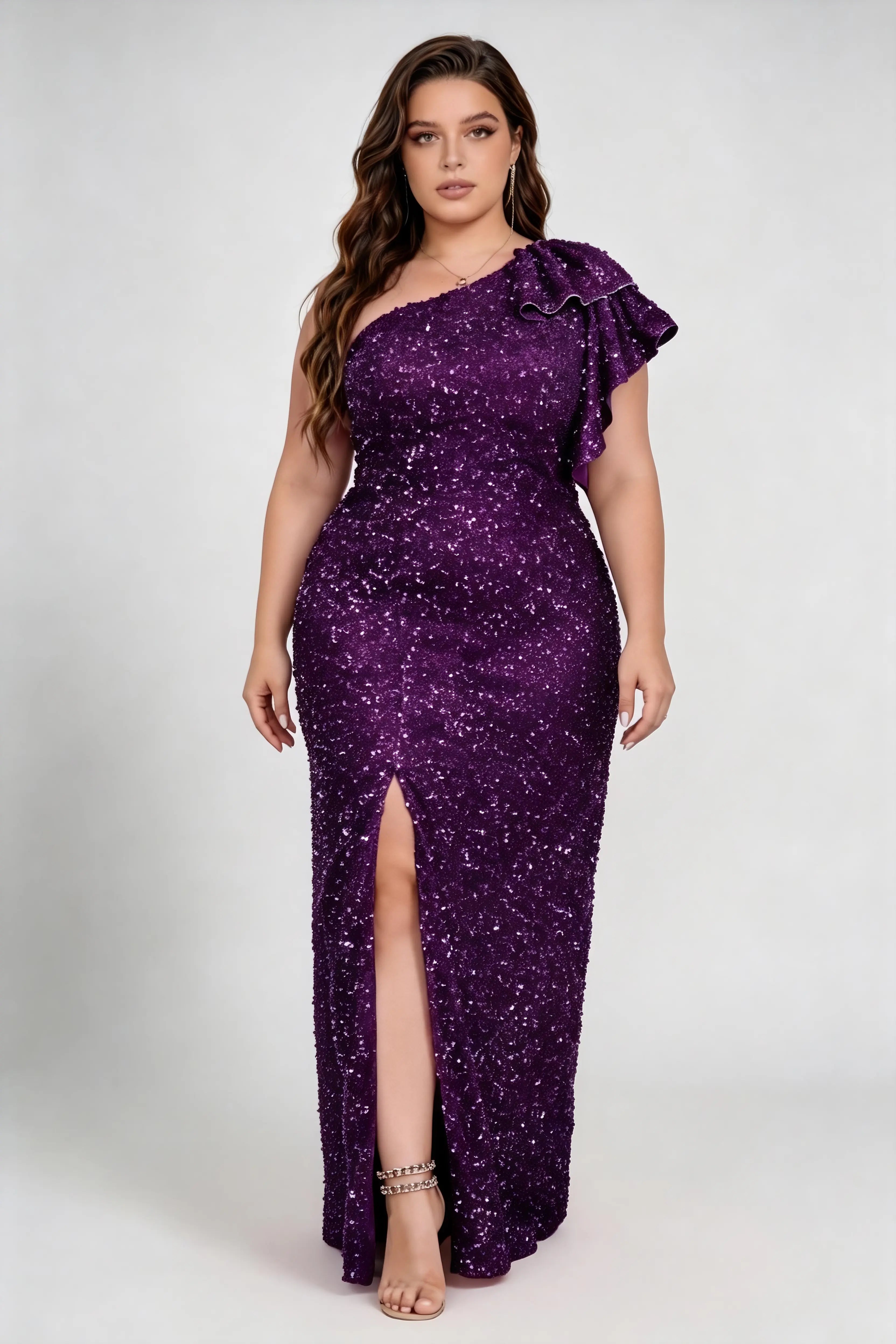 Curvy model wearing plus size purple one shoulder ruffle all over sequin high split mermaid maxi formal evening gown