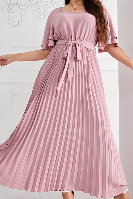 Curvy model wearing plus size pink round neck double layer ruffle sleeve tie waist pleated a-line midi dress