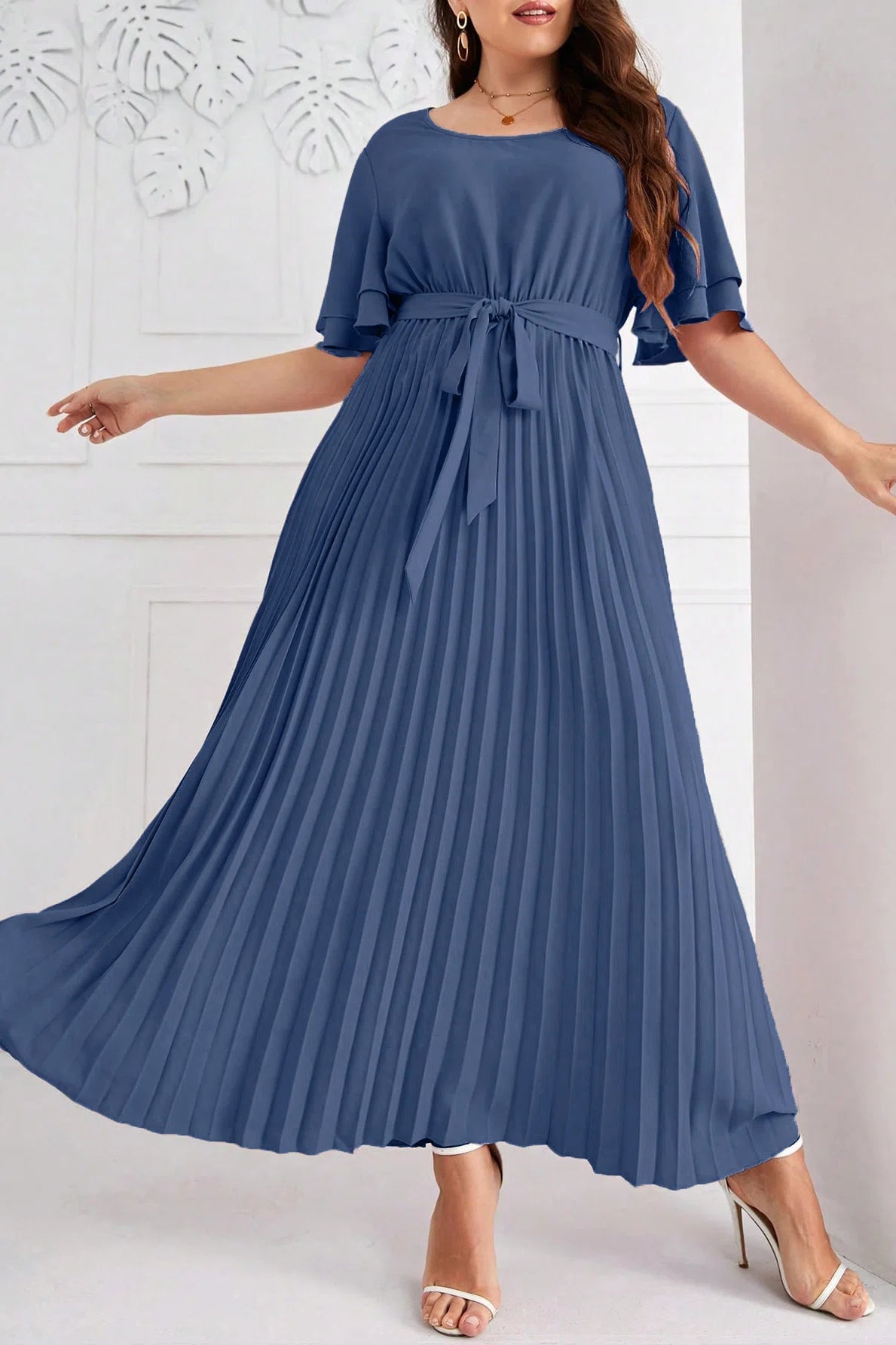 Curvy model wearing plus size blue round neck double layer ruffle sleeve tie waist pleated a-line midi dress