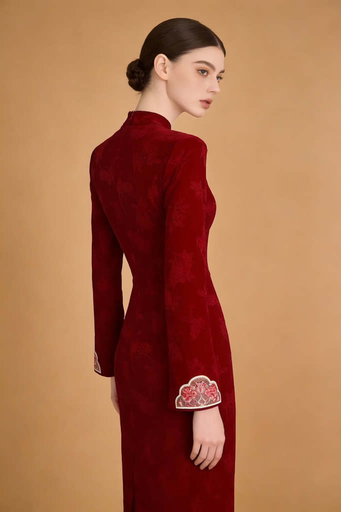 Woman wearing a Red Floral Embroidered Qipao Dress on a brown background