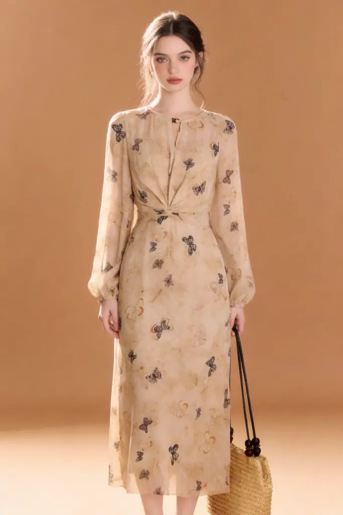 Woman wearing Vintage Butterfly Print Chiffon Midi Dress - Beige Elegant Long Sleeve A-Line Dress against a brown background
