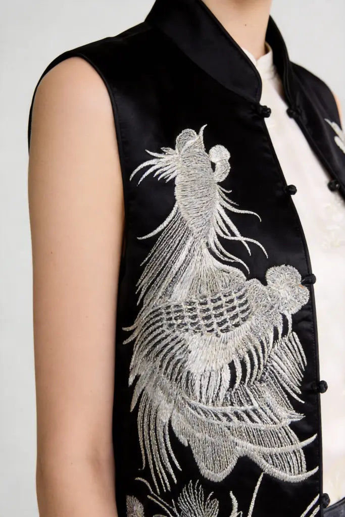 Woman wearing a Traditional Chinese Phoenix Embroidery Vest & Gradient Skirt Set - Elegant Oriental Fashion on a light gray background