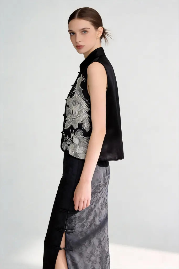 Woman wearing a Traditional Chinese Phoenix Embroidery Vest & Gradient Skirt Set - Elegant Oriental Fashion on a light gray background
